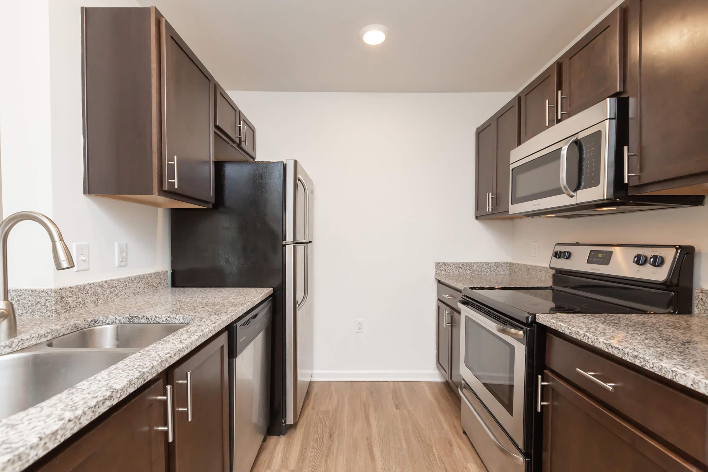 a modern kitchen with stainless steel appliances
