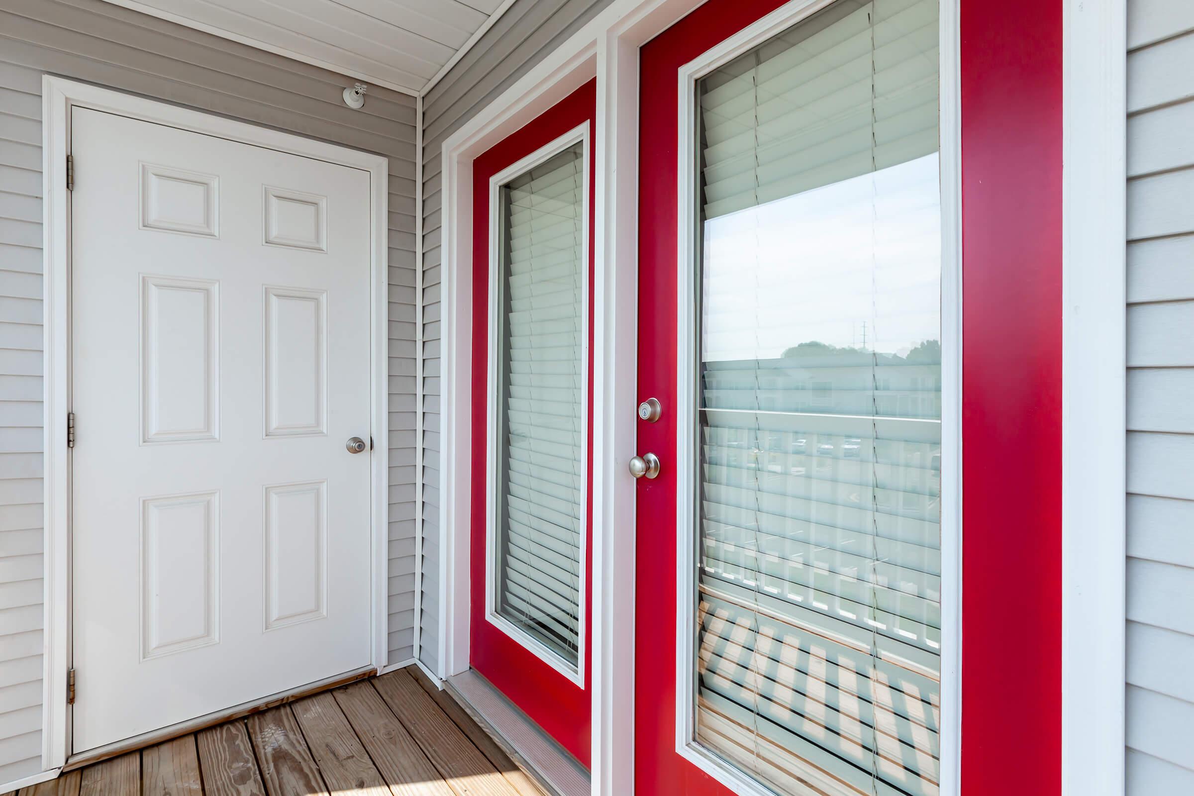 a close up of a red door