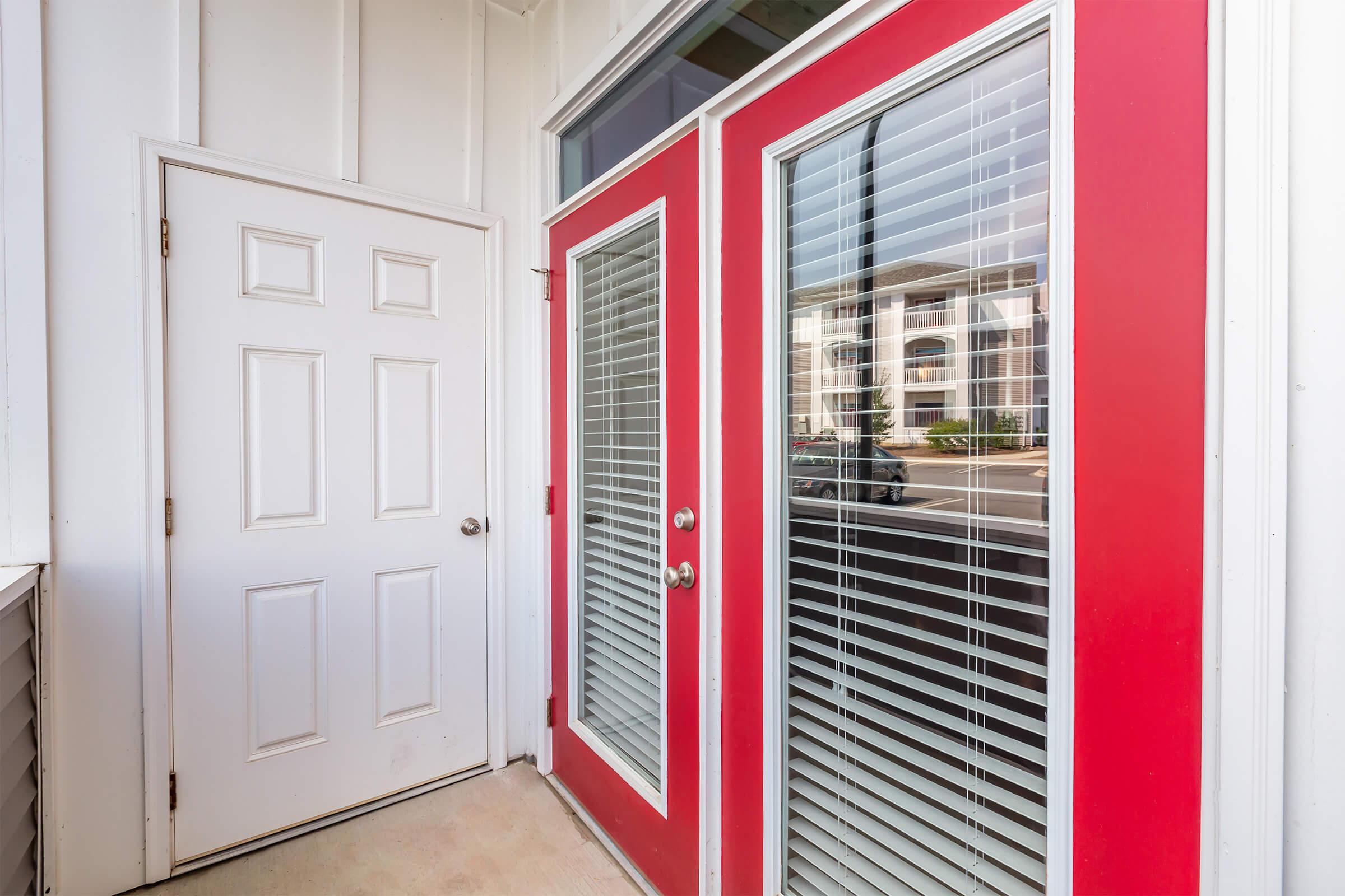 a close up of a red door