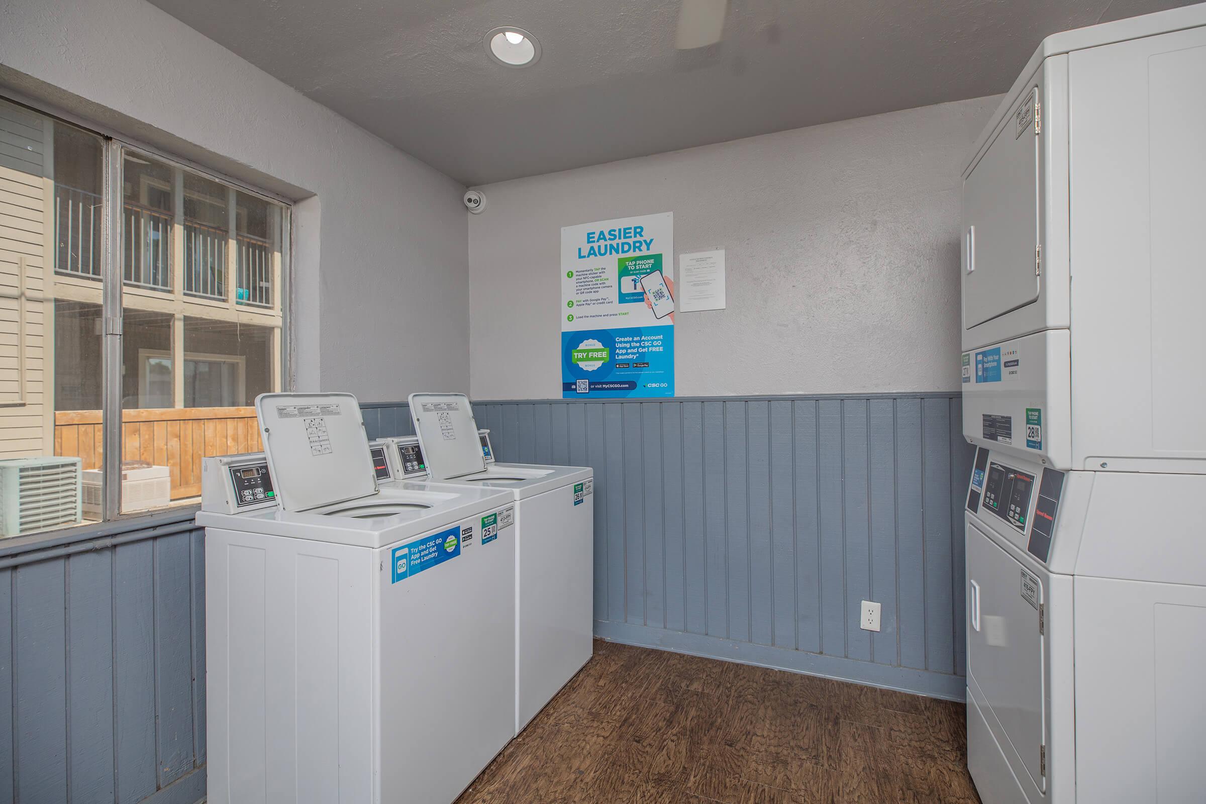 a kitchen with a sink and a refrigerator