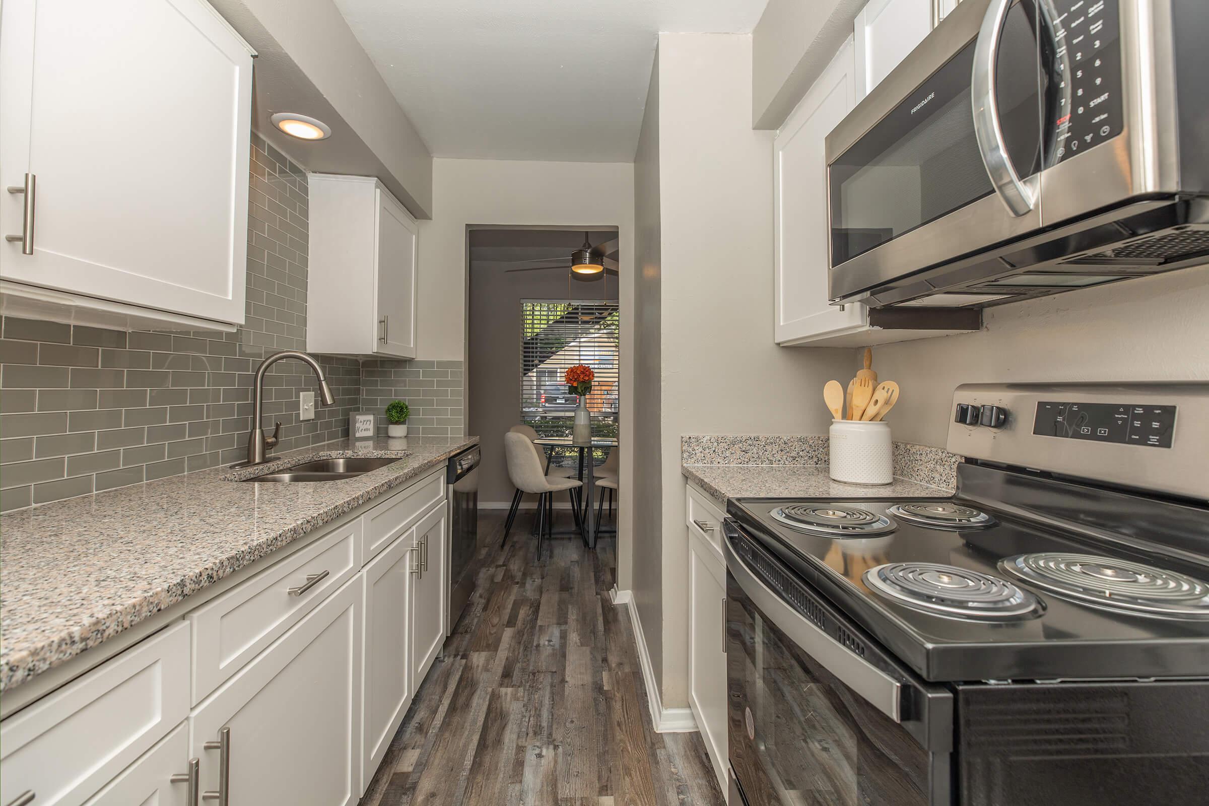 a kitchen with stainless steel appliances