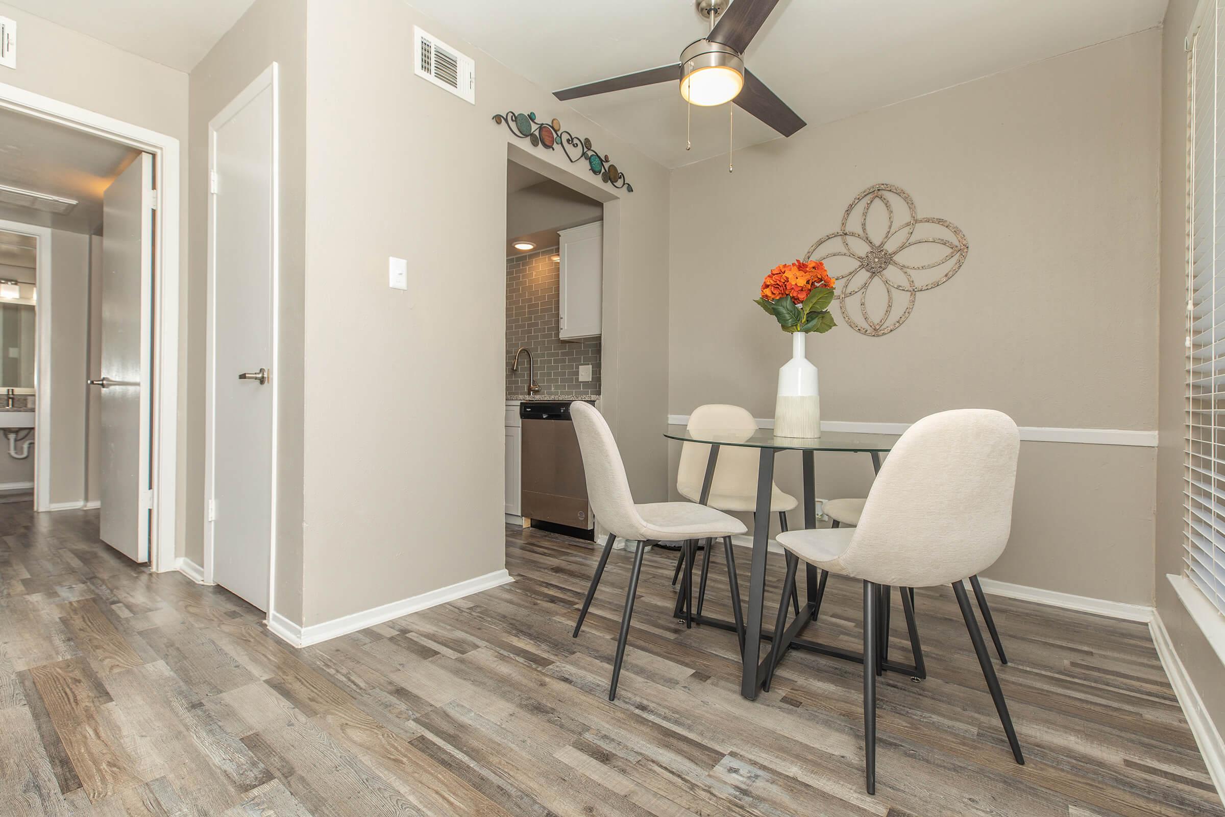 a room filled with furniture and a large window