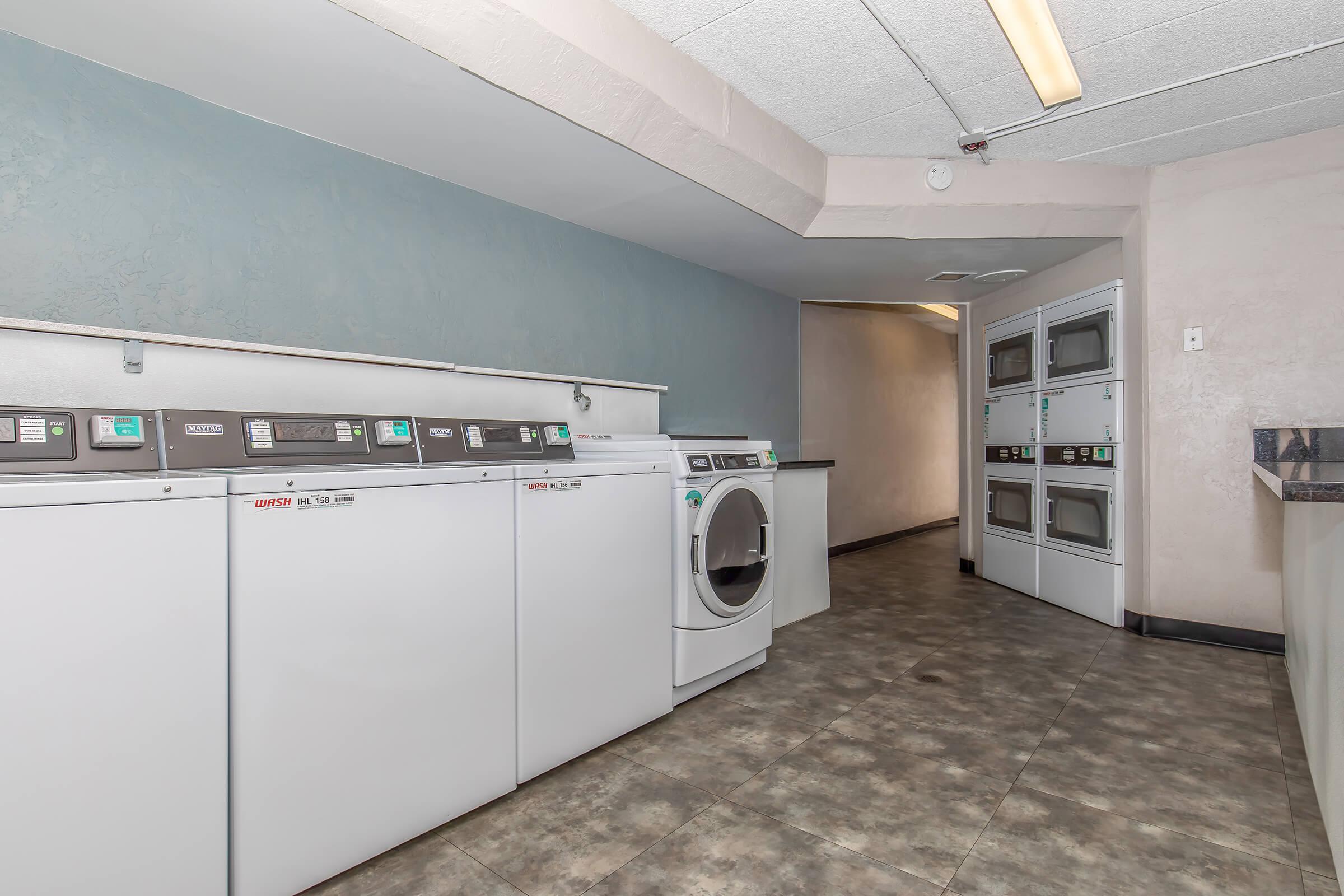 a kitchen with a stove and a refrigerator