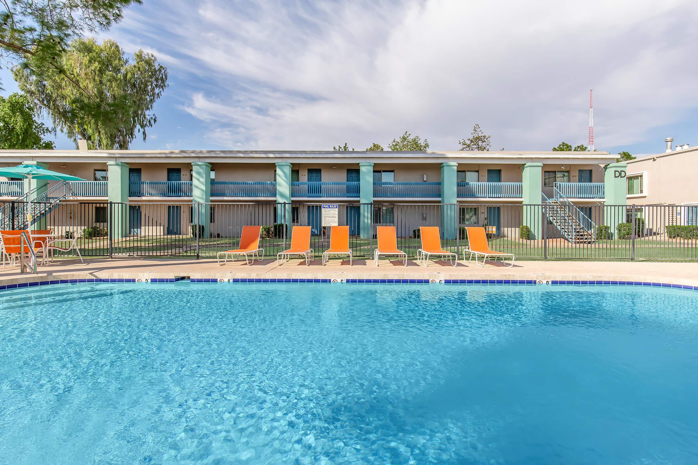 a large pool of water in front of a building