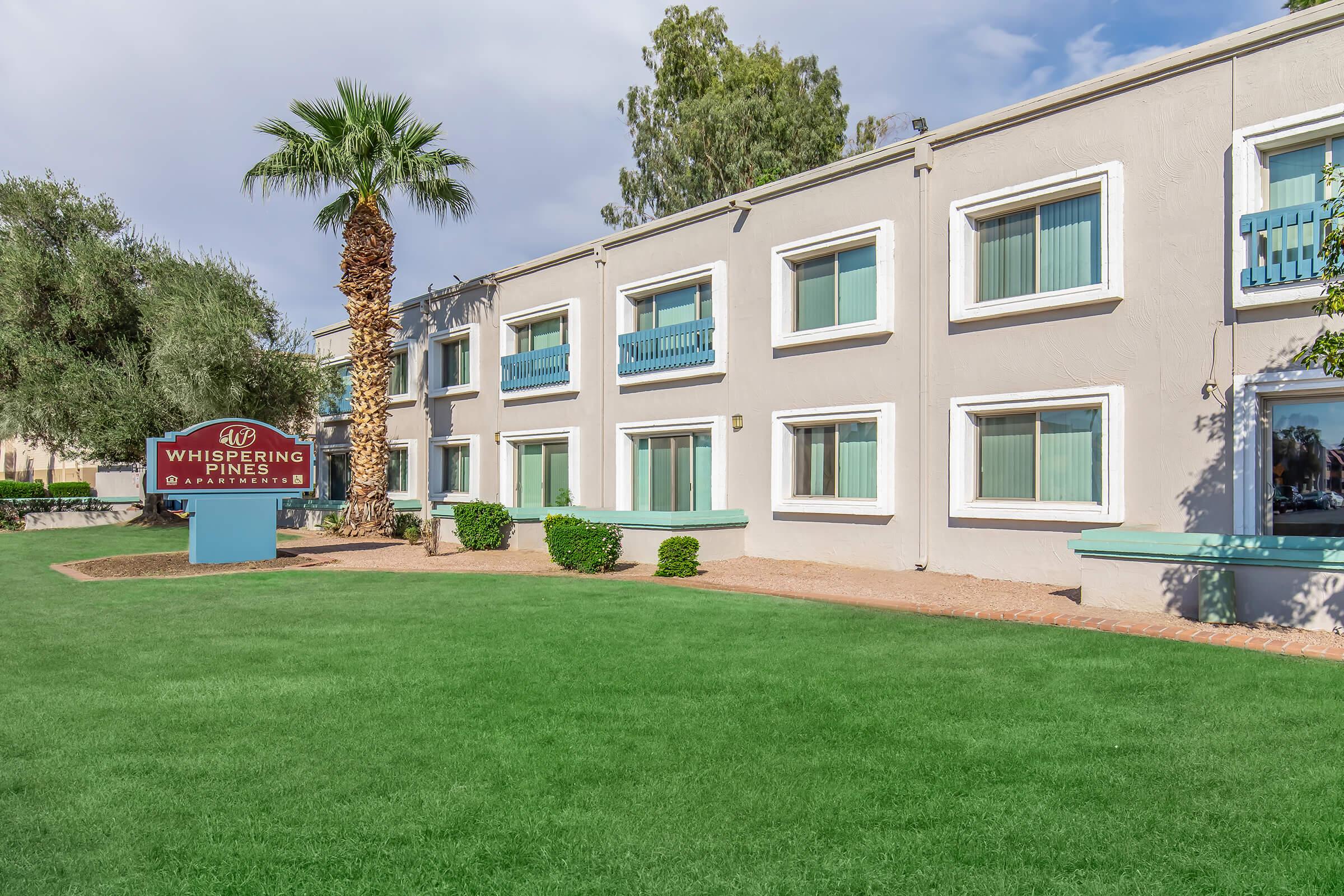 a large lawn in front of a building