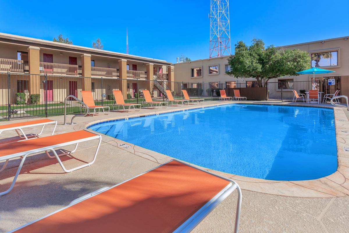 Whispering Pines community pool with orange chairs