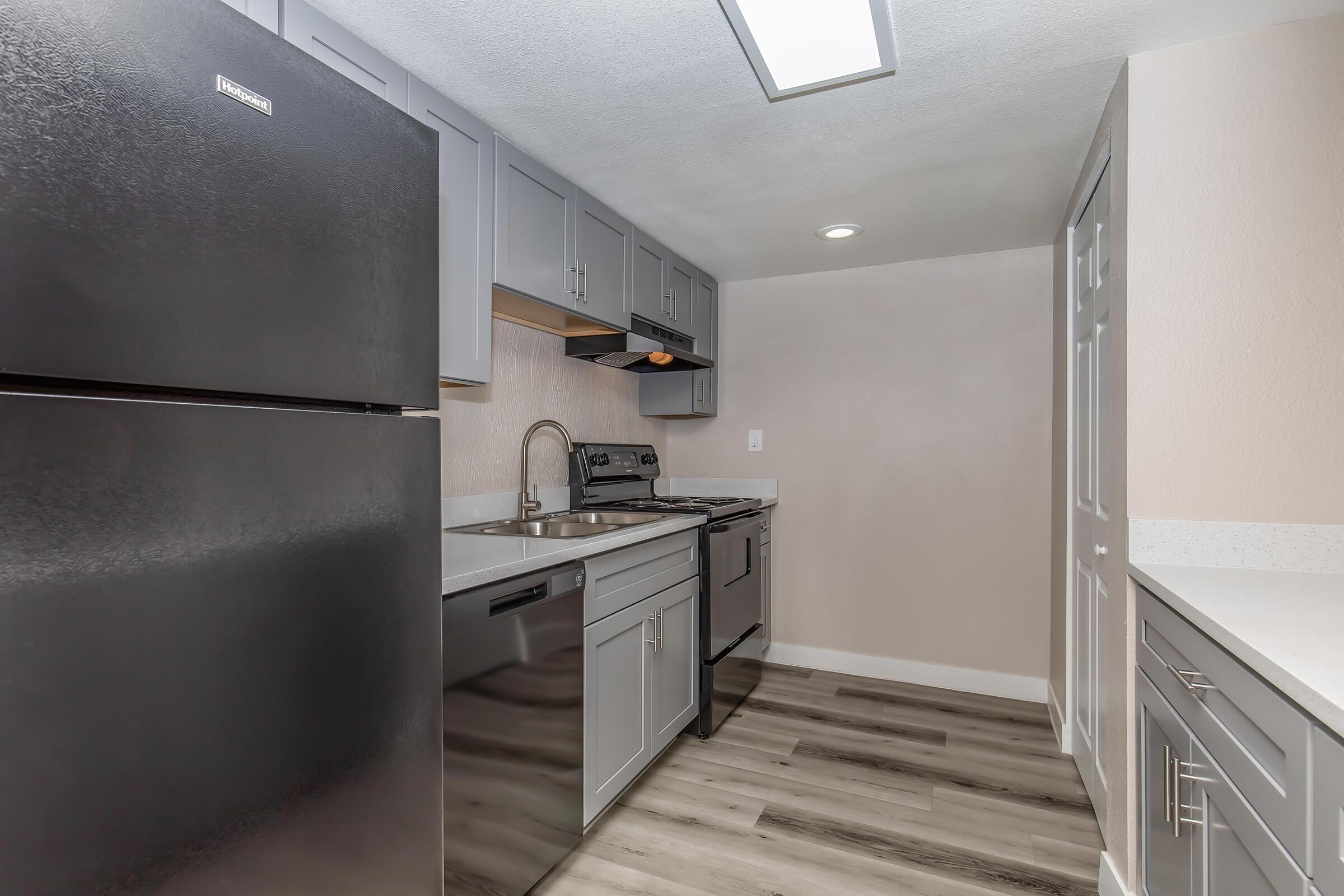 a stainless steel refrigerator in a kitchen