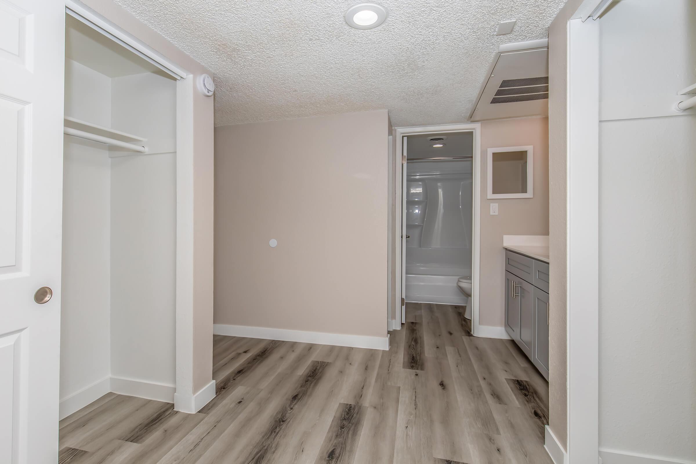 a kitchen with an open door