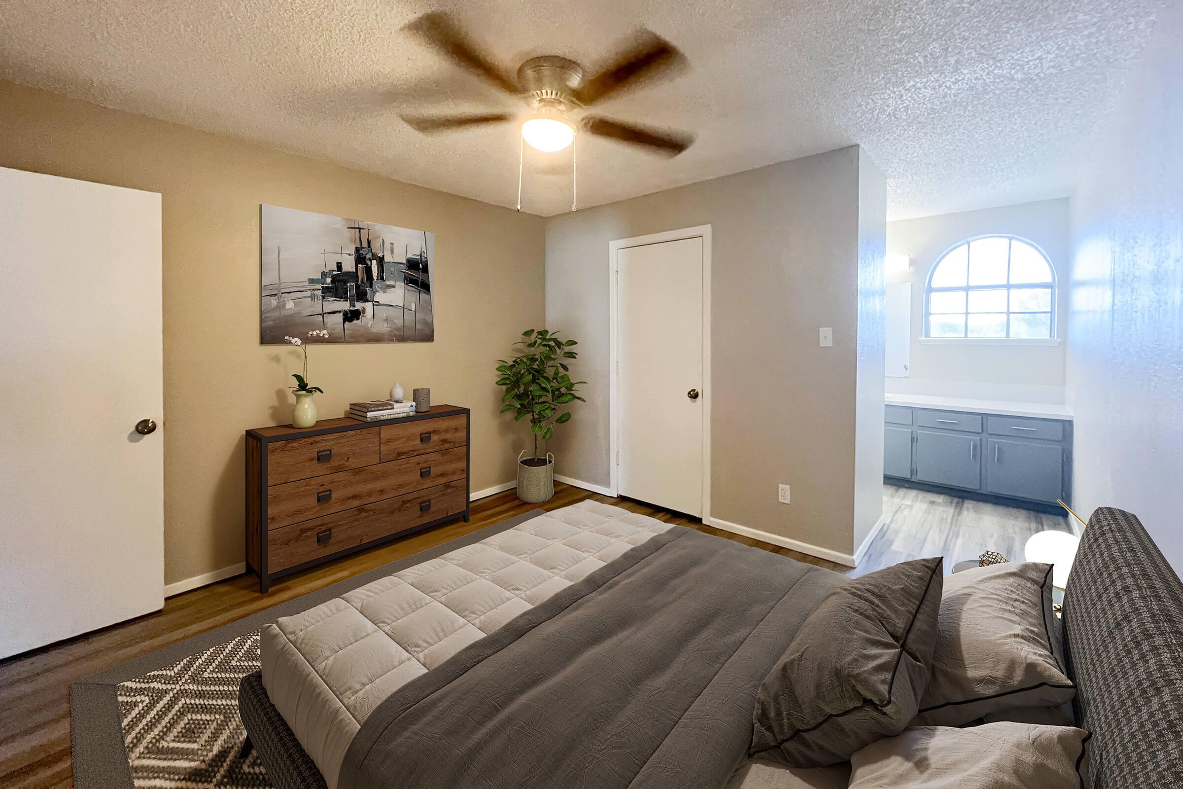 a bedroom with a large bed in a room