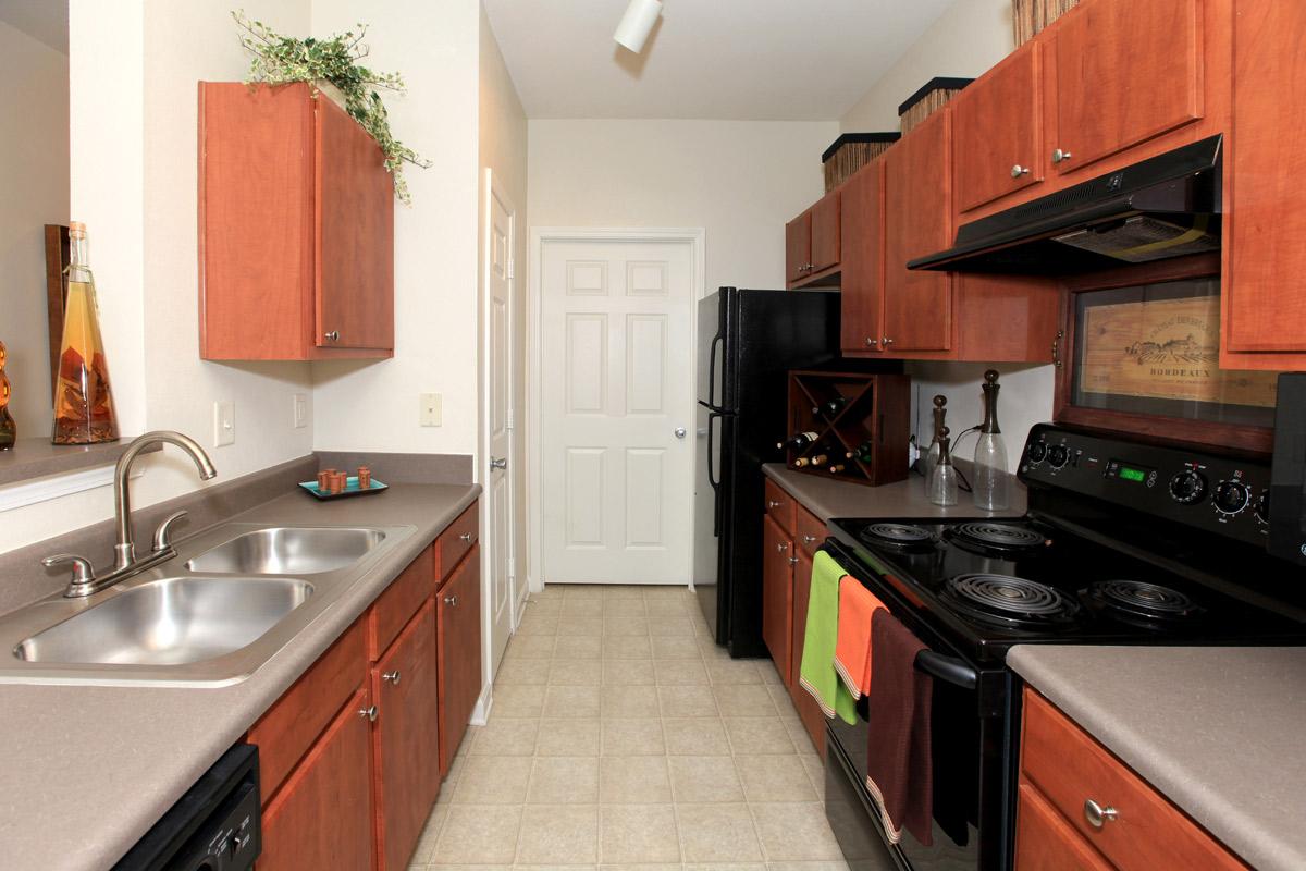 a modern kitchen with stainless steel appliances