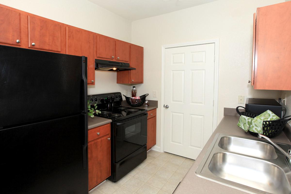 a modern kitchen with stainless steel appliances