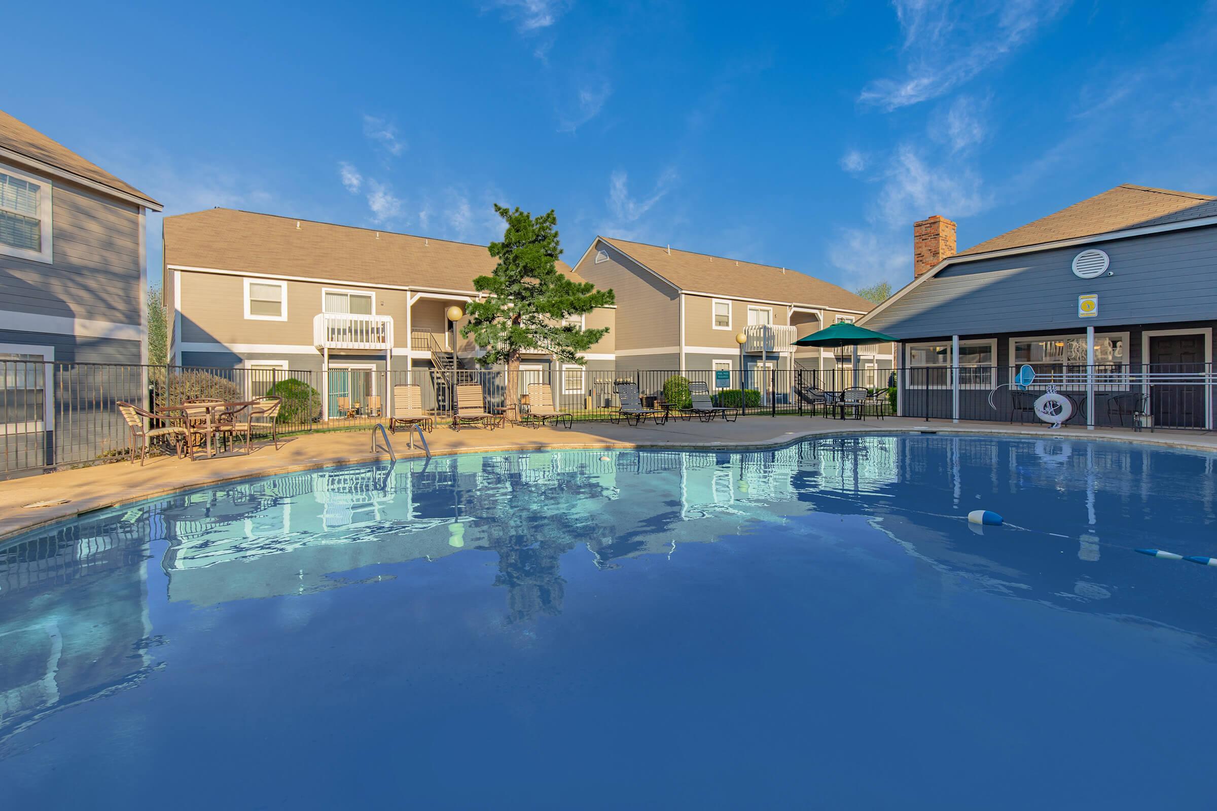 a house with a large pool of water