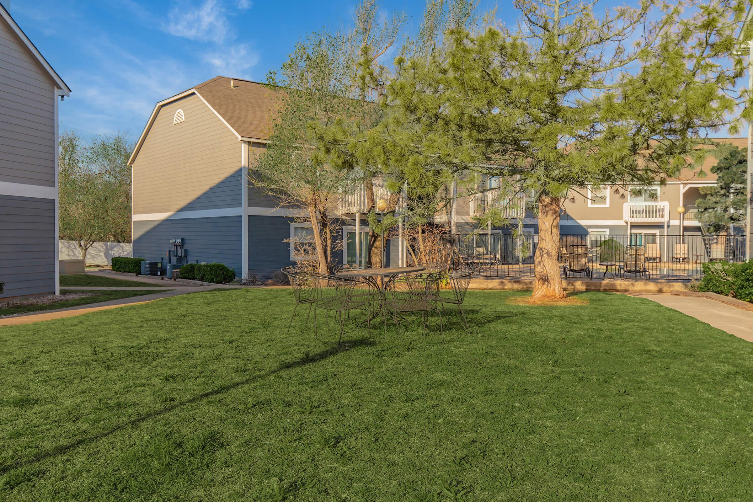 a large lawn in front of a house