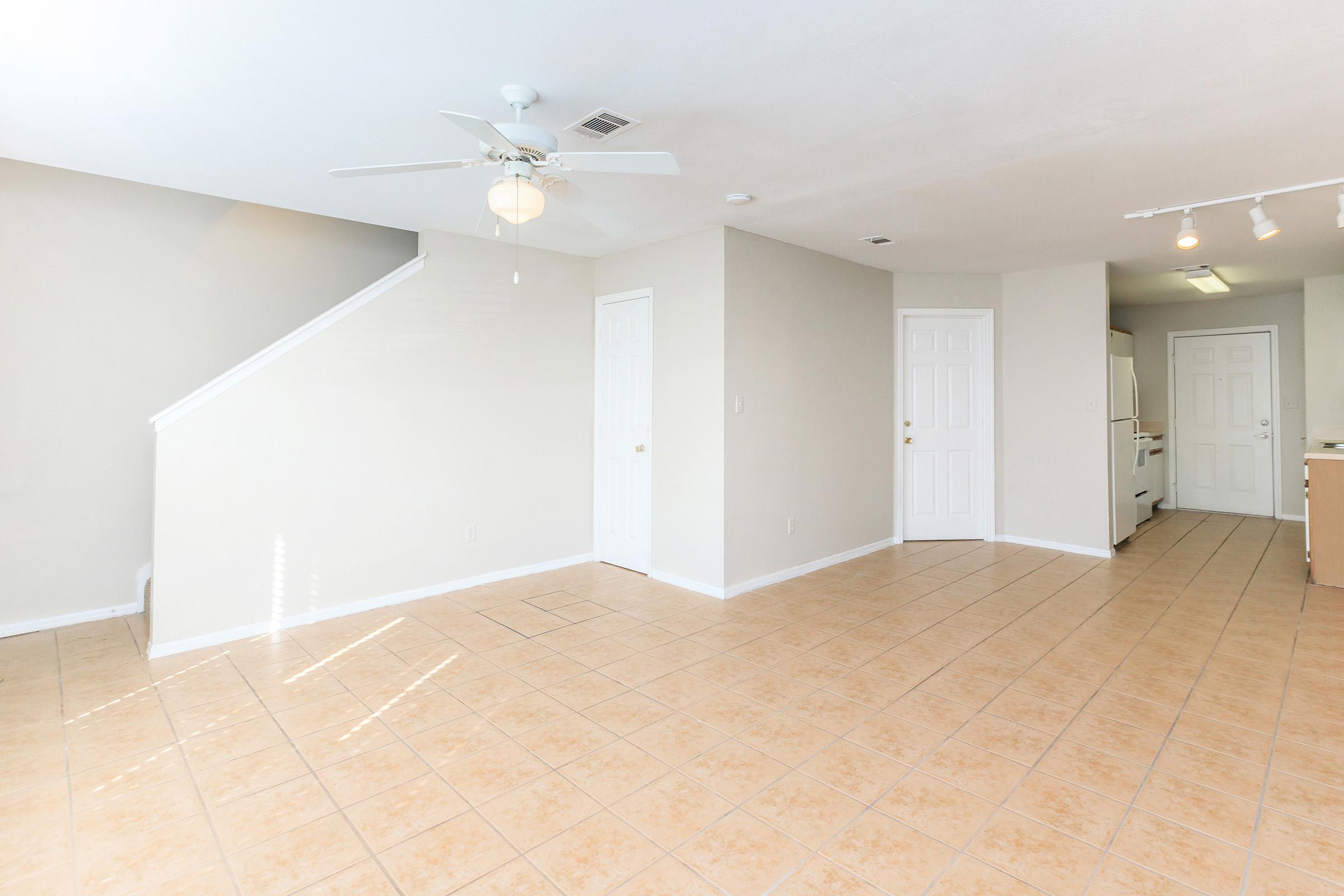 a kitchen with a tile floor