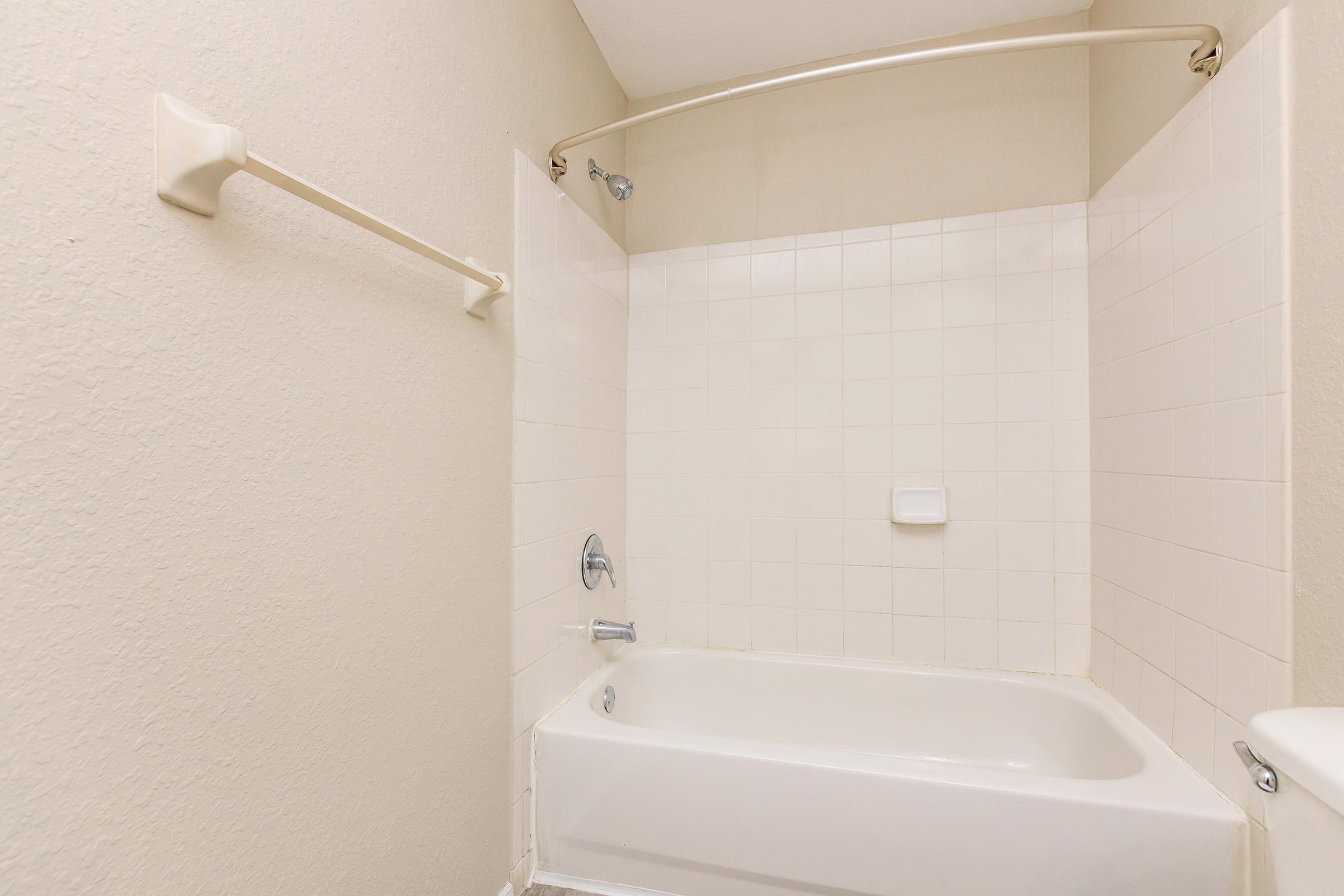 a close up of a sink and a bath tub