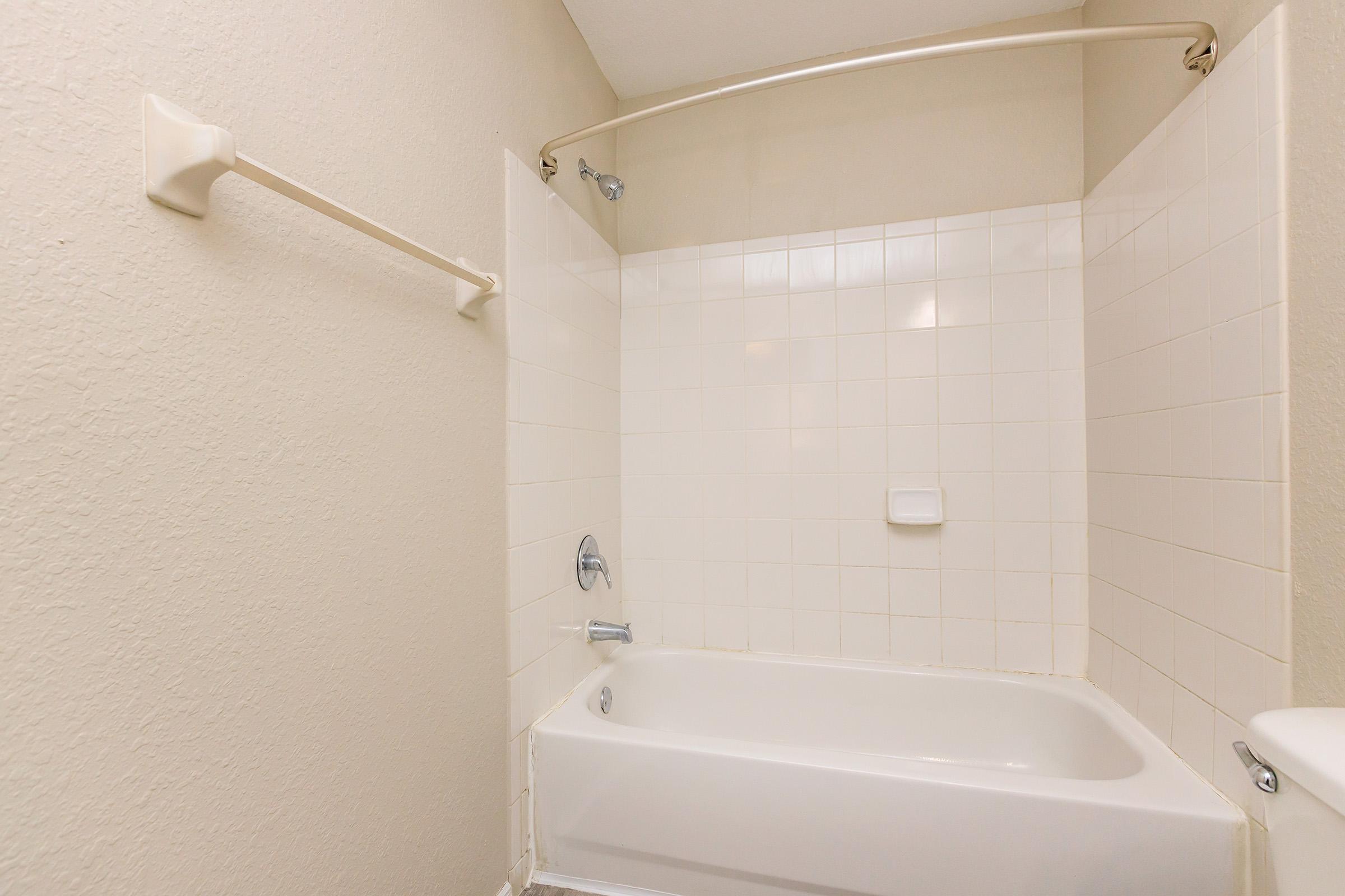 a close up of a sink and a bath tub