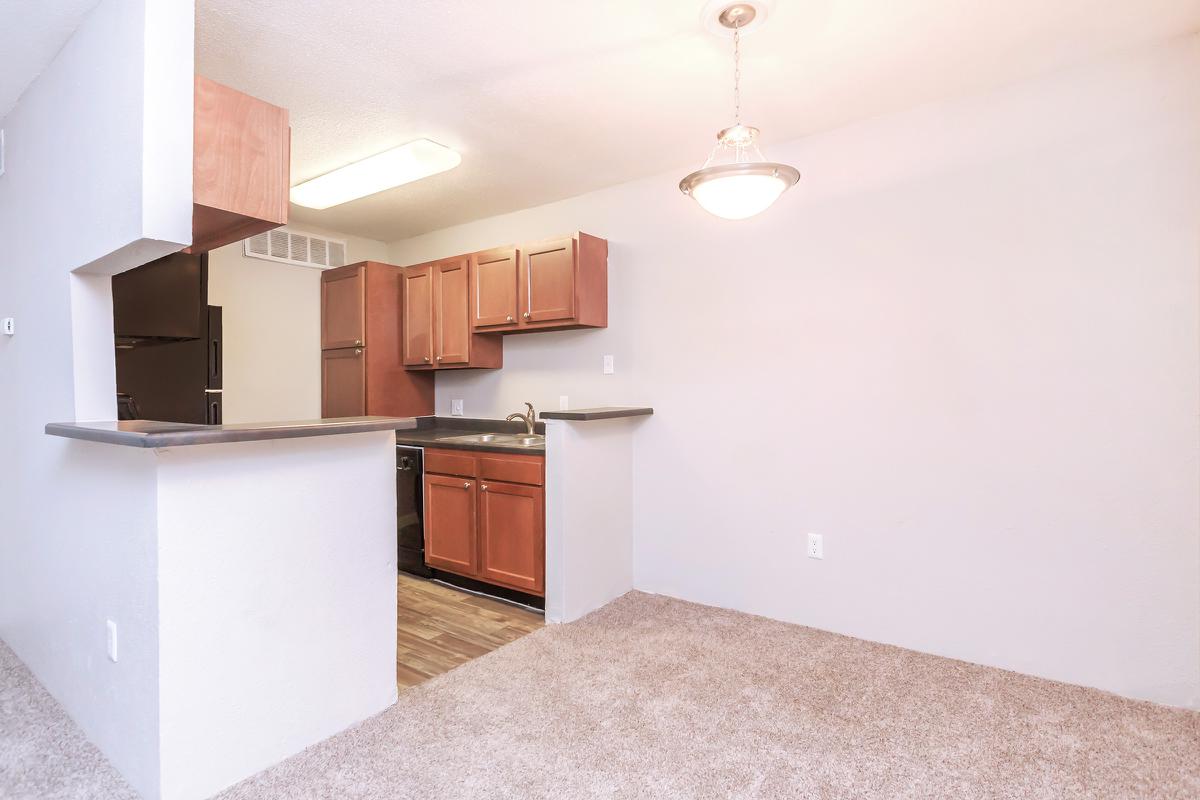 a large white refrigerator in a kitchen