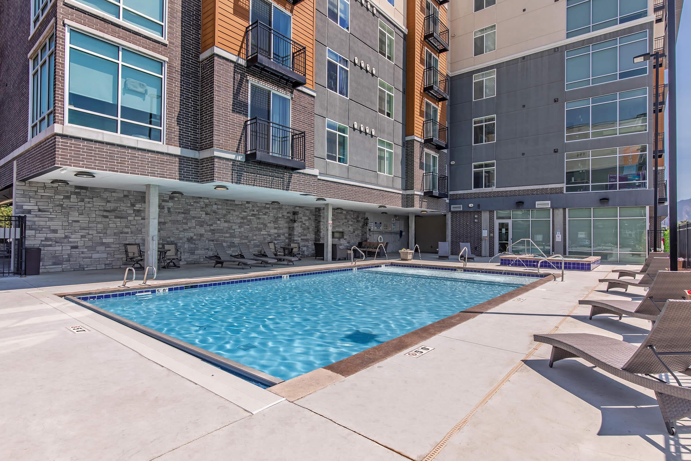 a large pool of water in front of a building