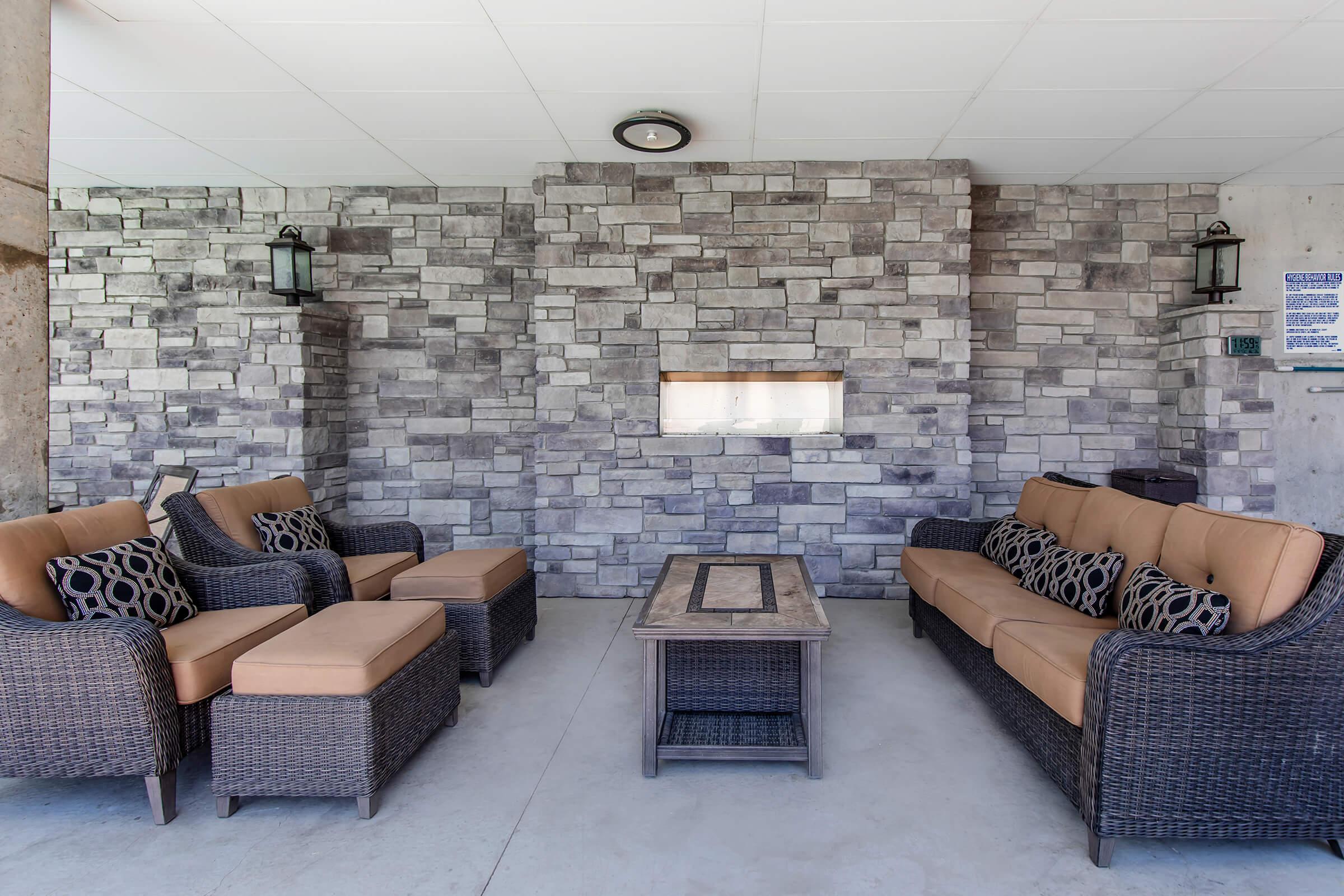 a room filled with furniture and a fireplace