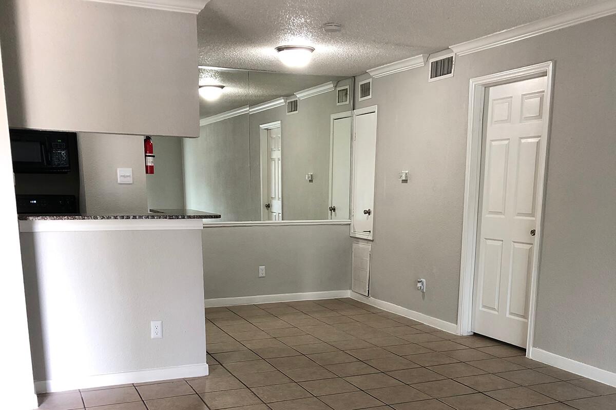 a refrigerator in a small room