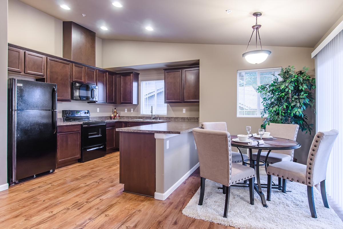 a room filled with furniture and a wood floor