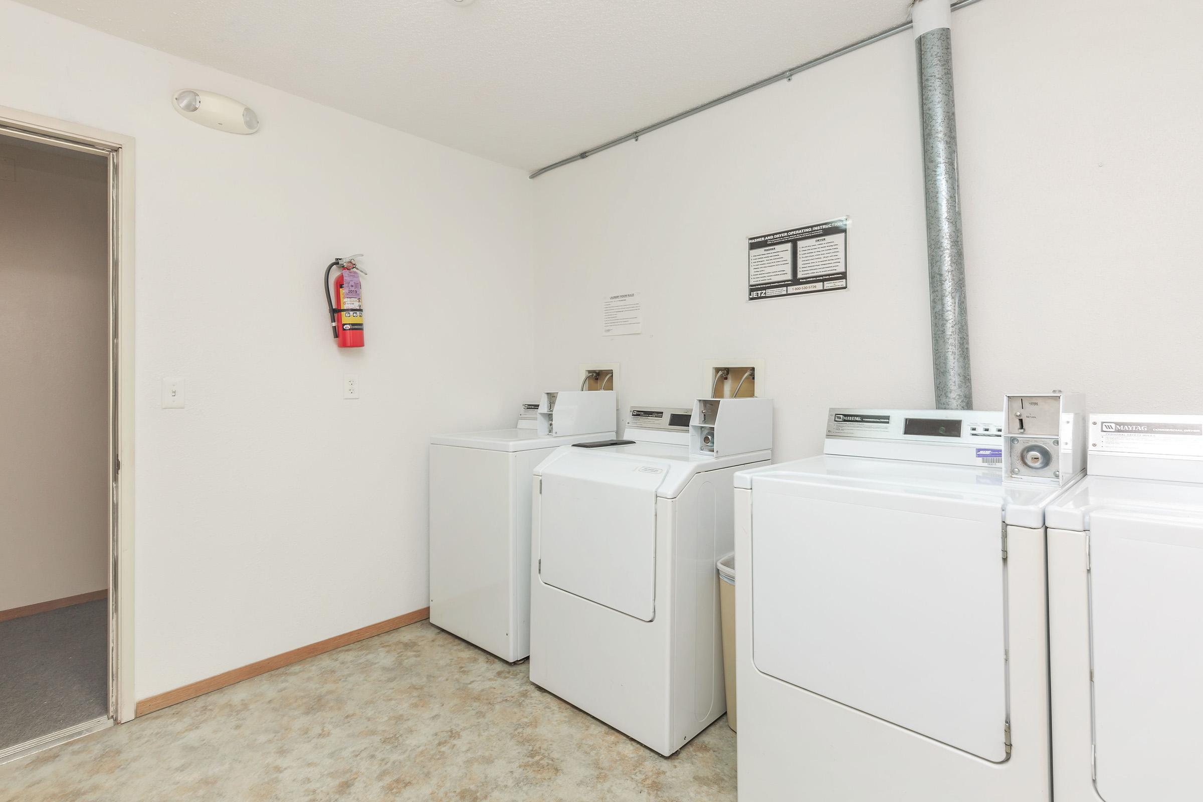 a white refrigerator freezer sitting in a room