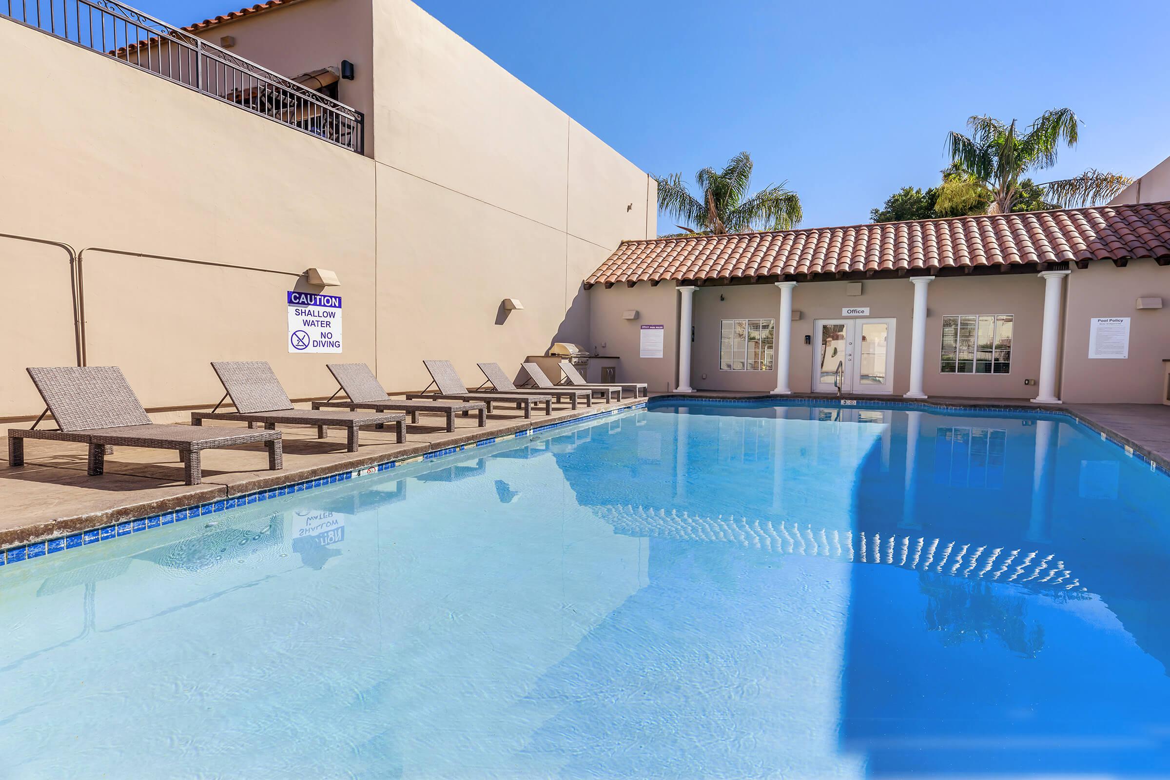 a pool next to a building