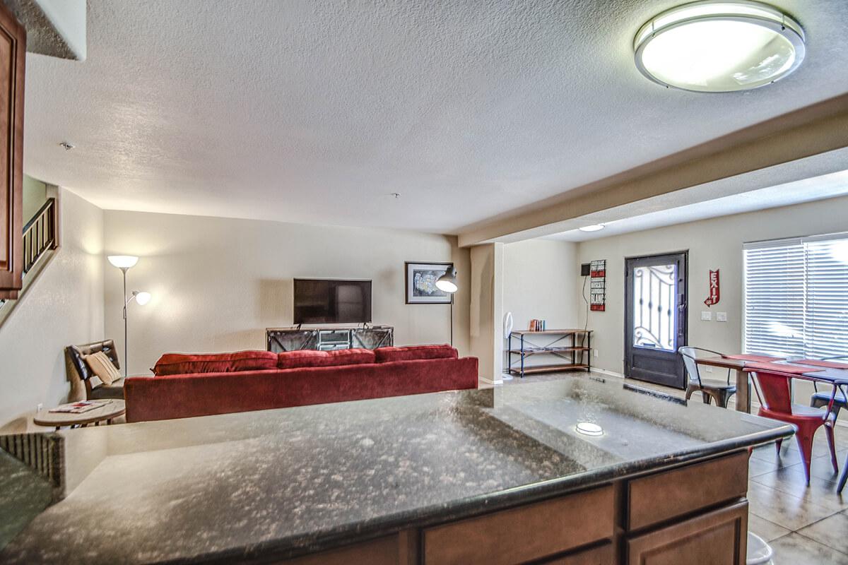 a kitchen with an island in the middle of a room