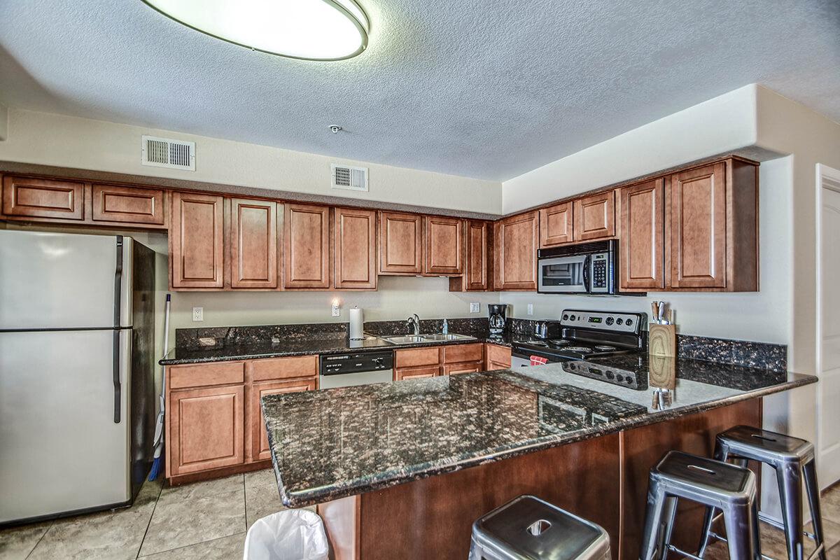 a modern kitchen with stainless steel appliances