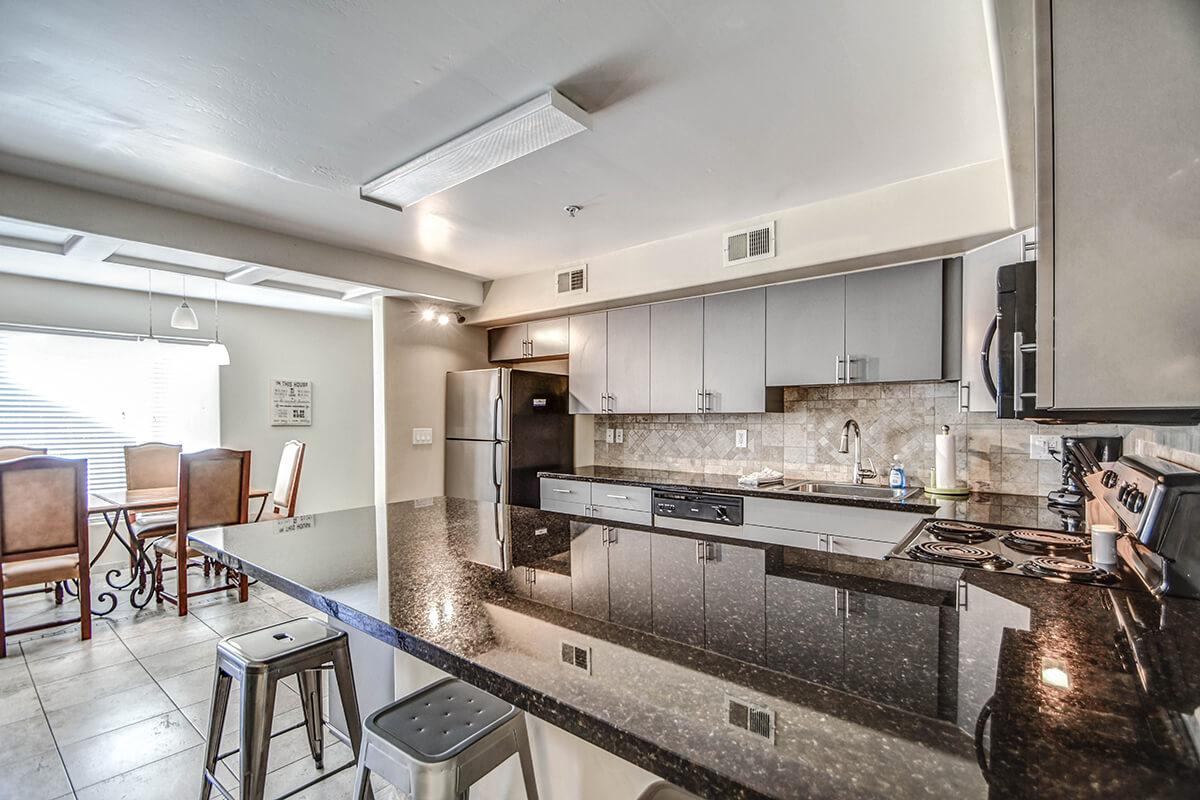 a kitchen with a table in a room