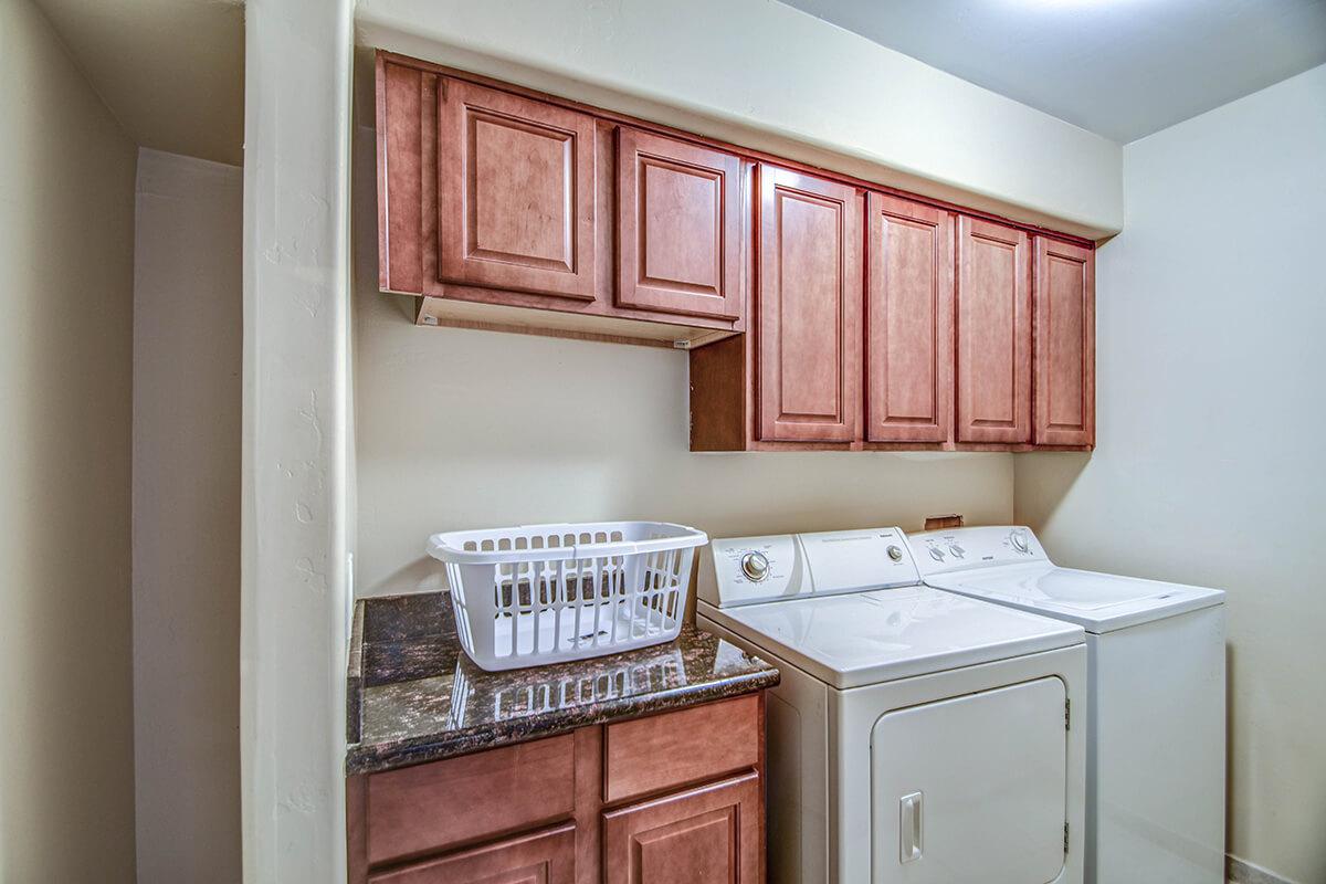 a kitchen with a stove top oven sitting inside of a refrigerator