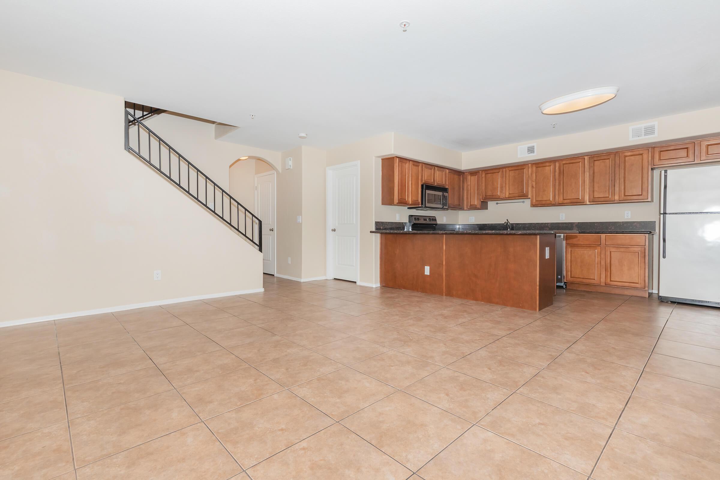 a kitchen with a wooden floor