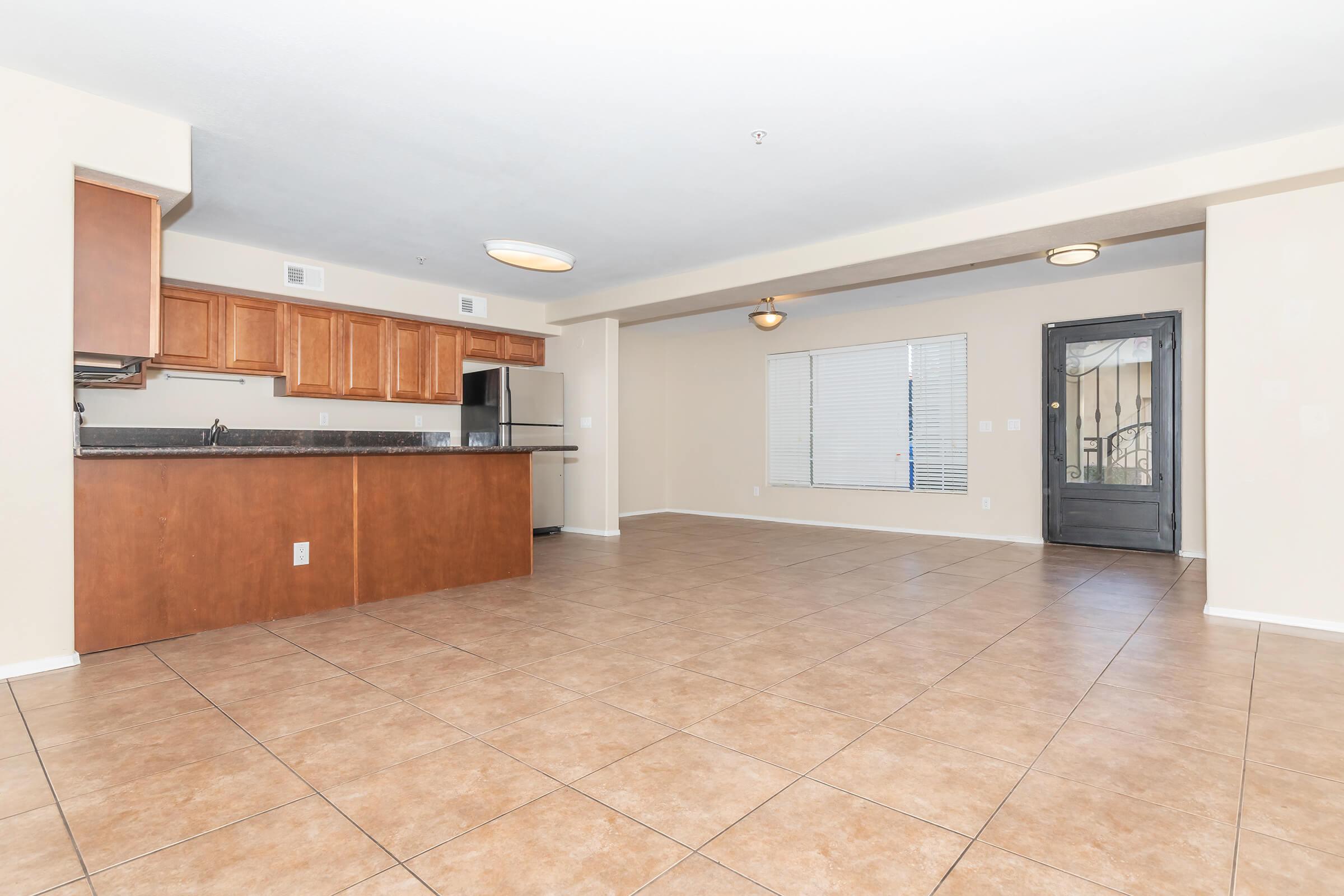 a kitchen with a wood floor