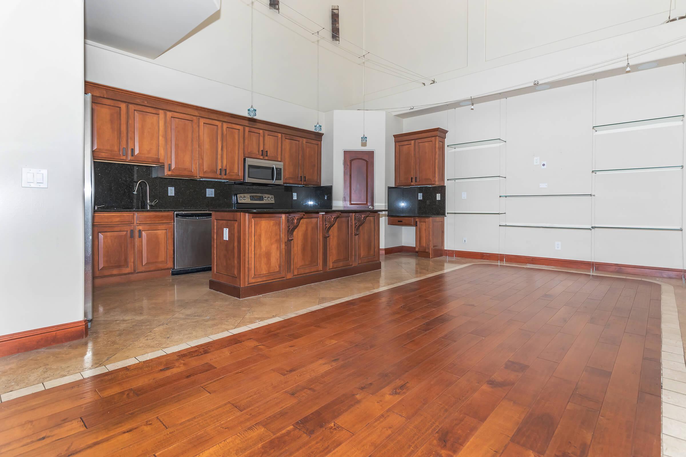 a kitchen with a wood floor