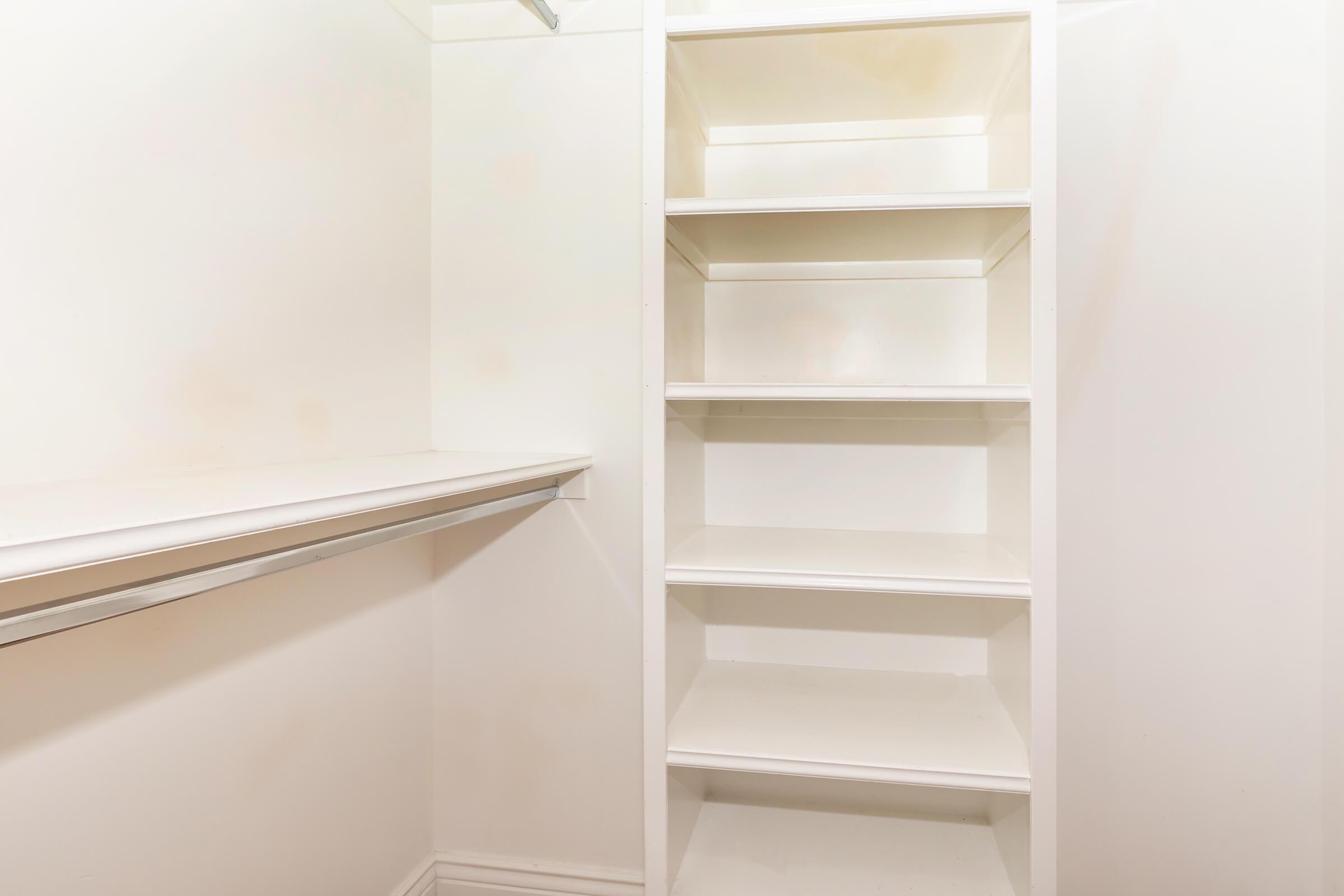 a white refrigerator freezer sitting in a room