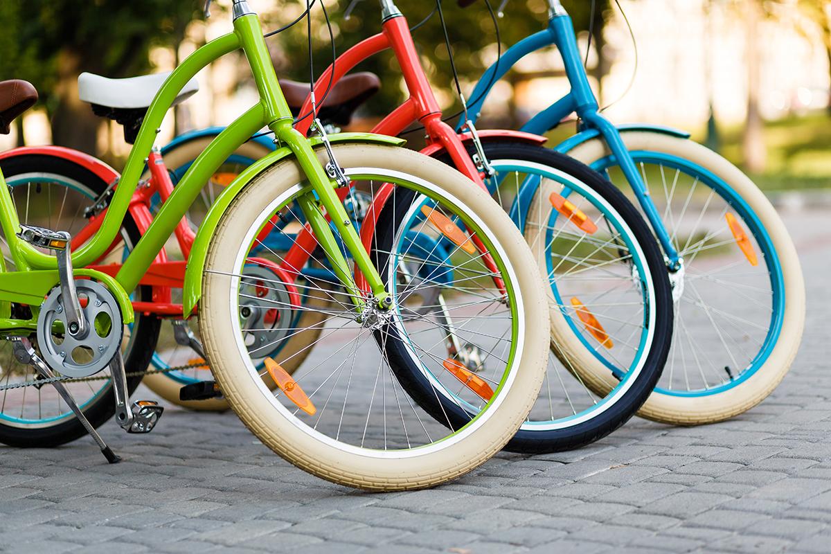 a bicycle is parked next to a basket