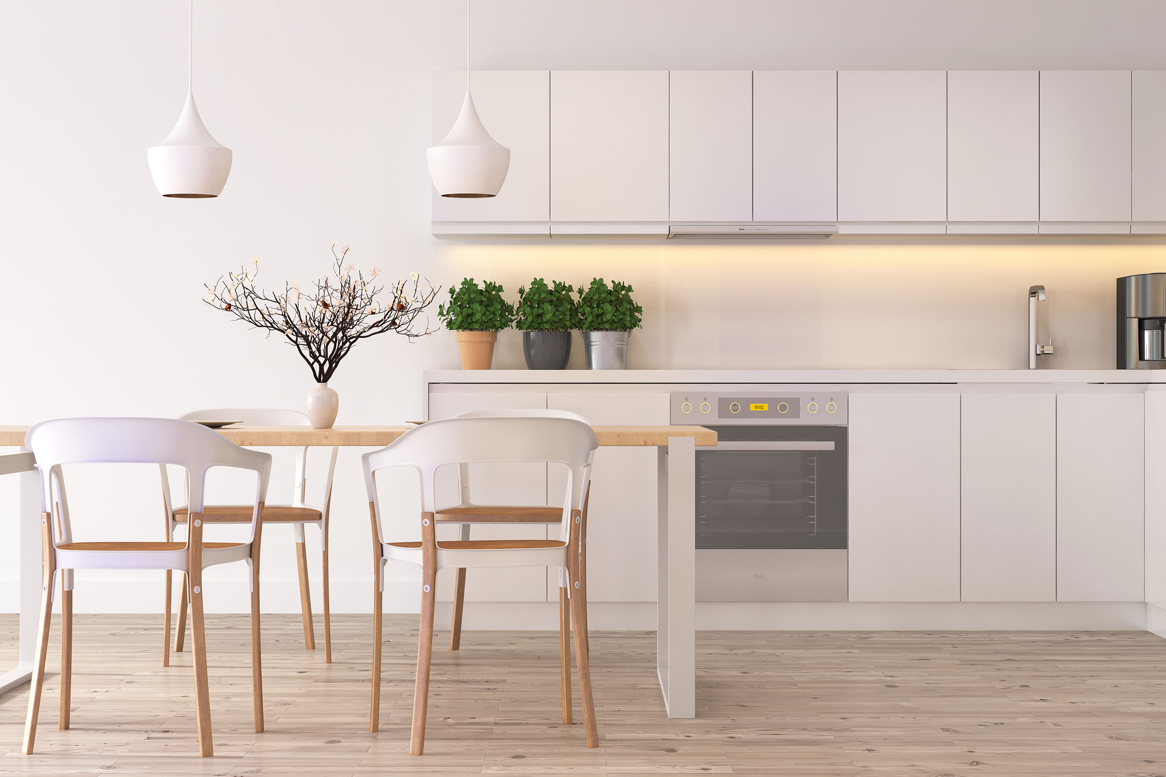 a kitchen with a white chair