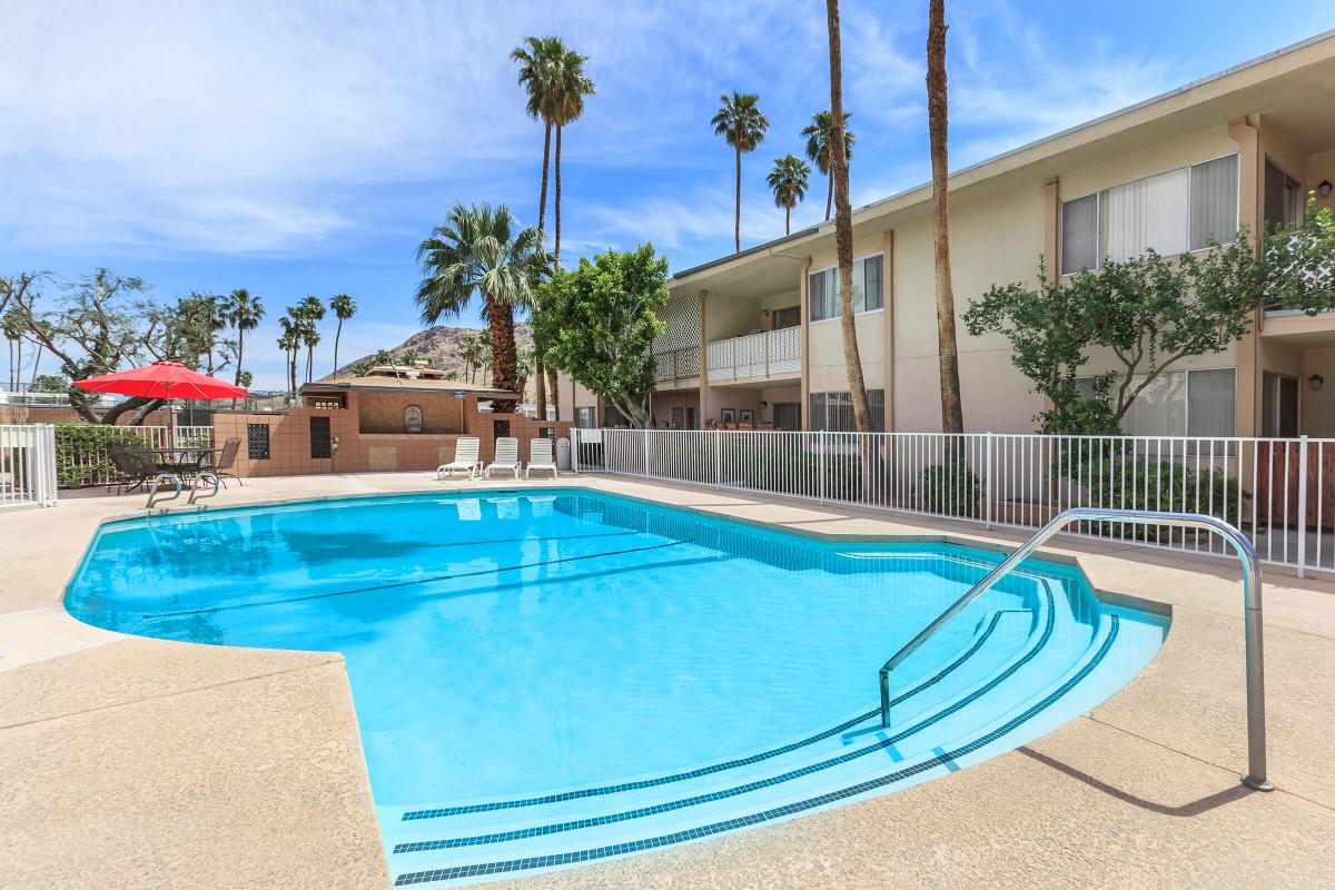 a pool in front of a building