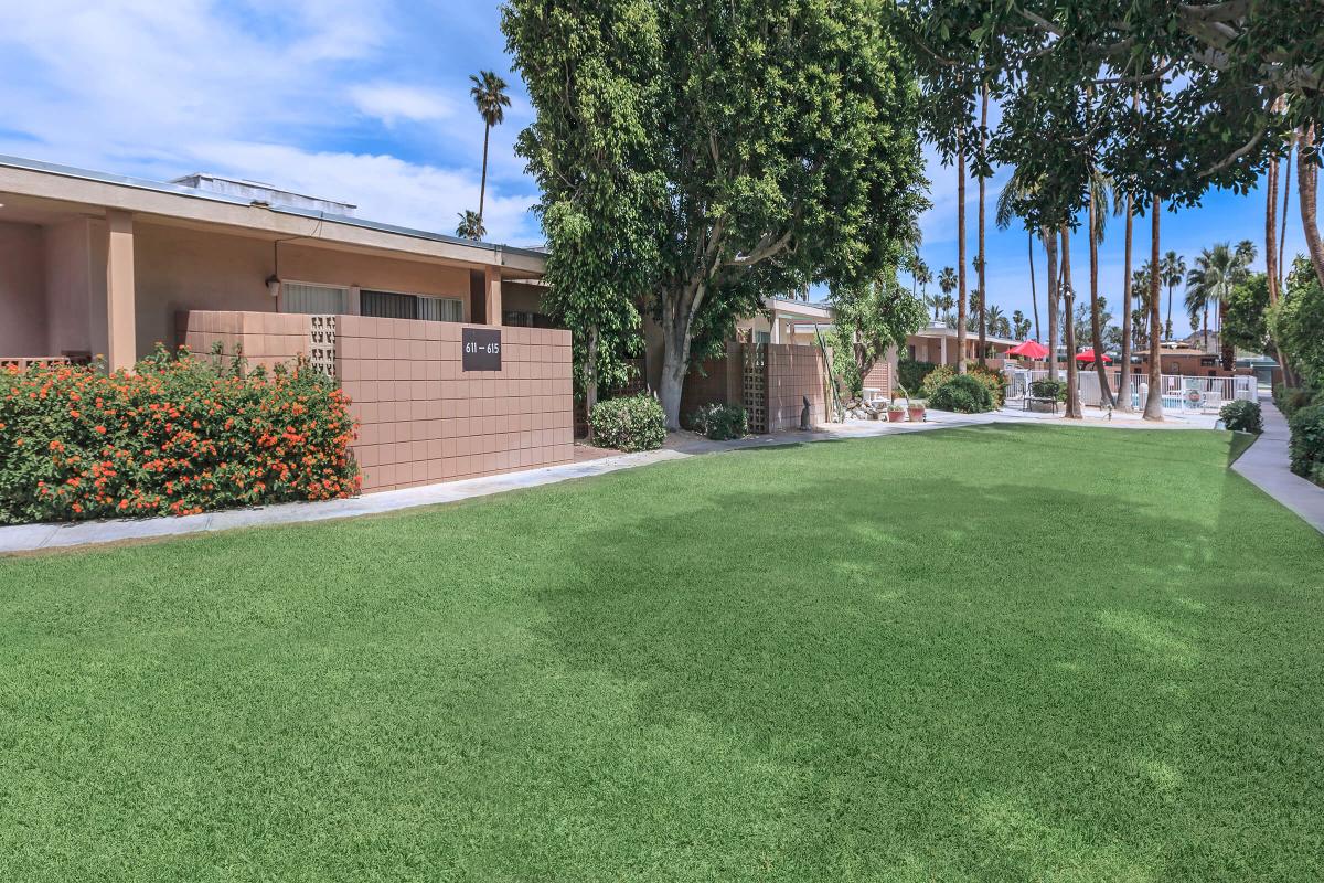 a large lawn in front of a building