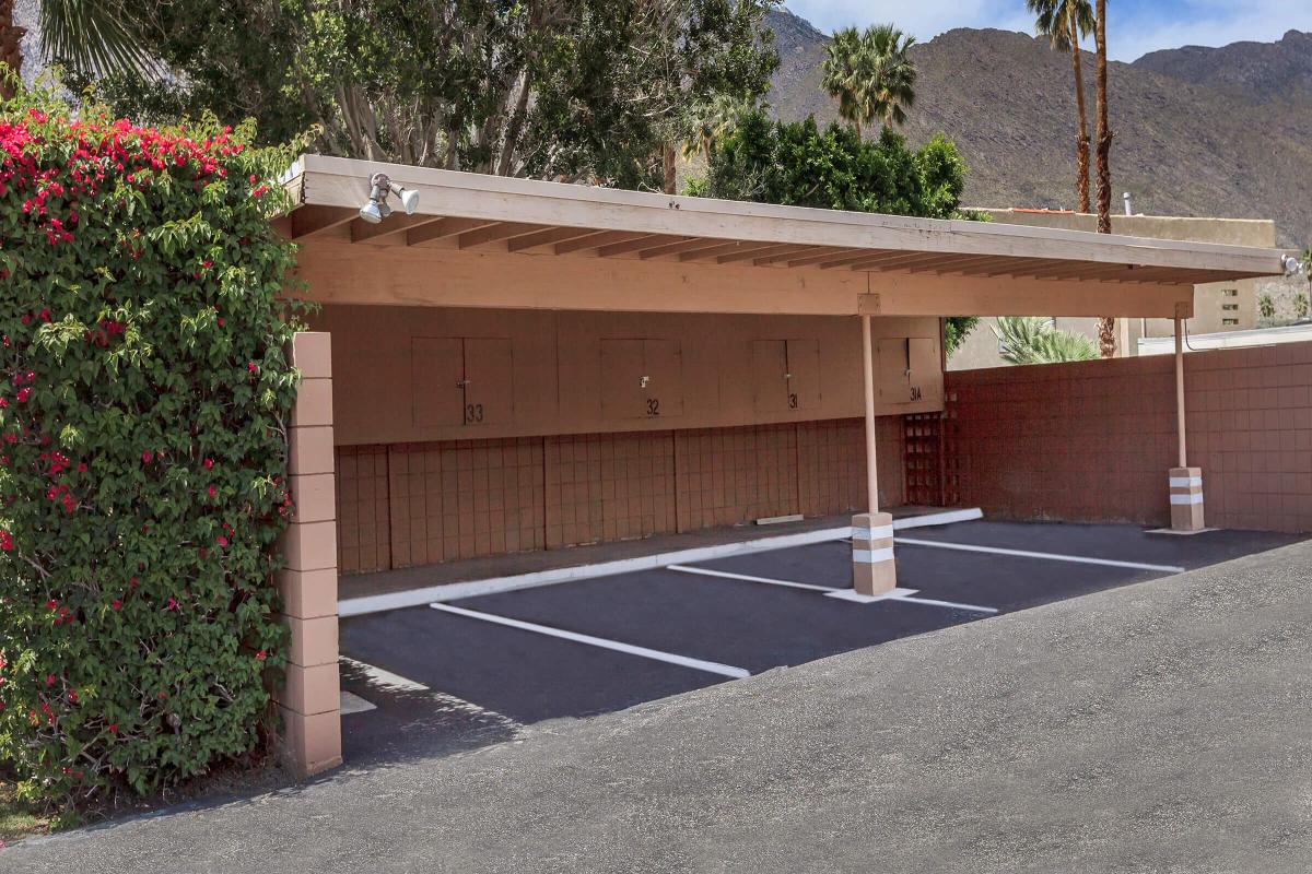 an empty parking lot in front of a building