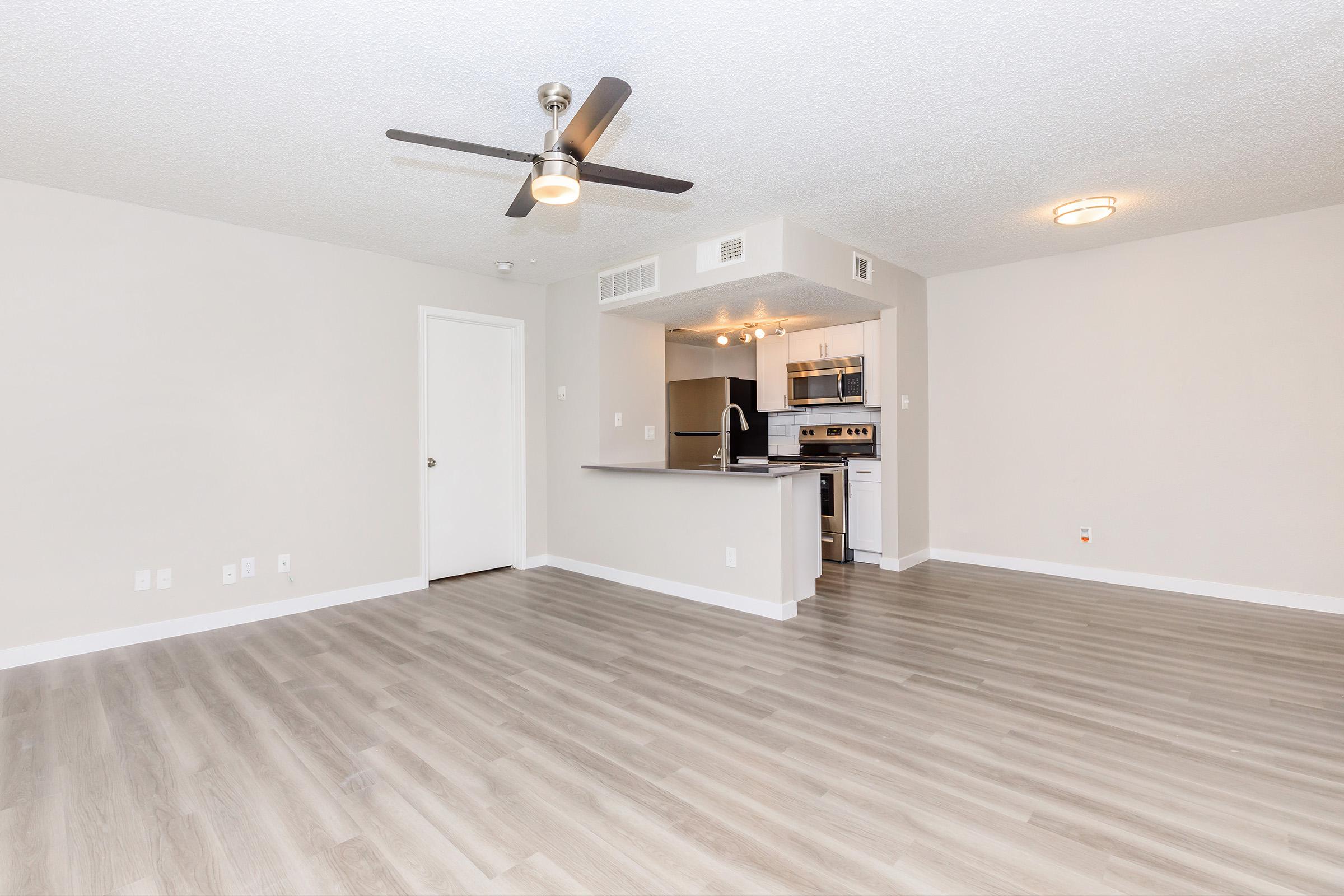 a kitchen with a wood floor