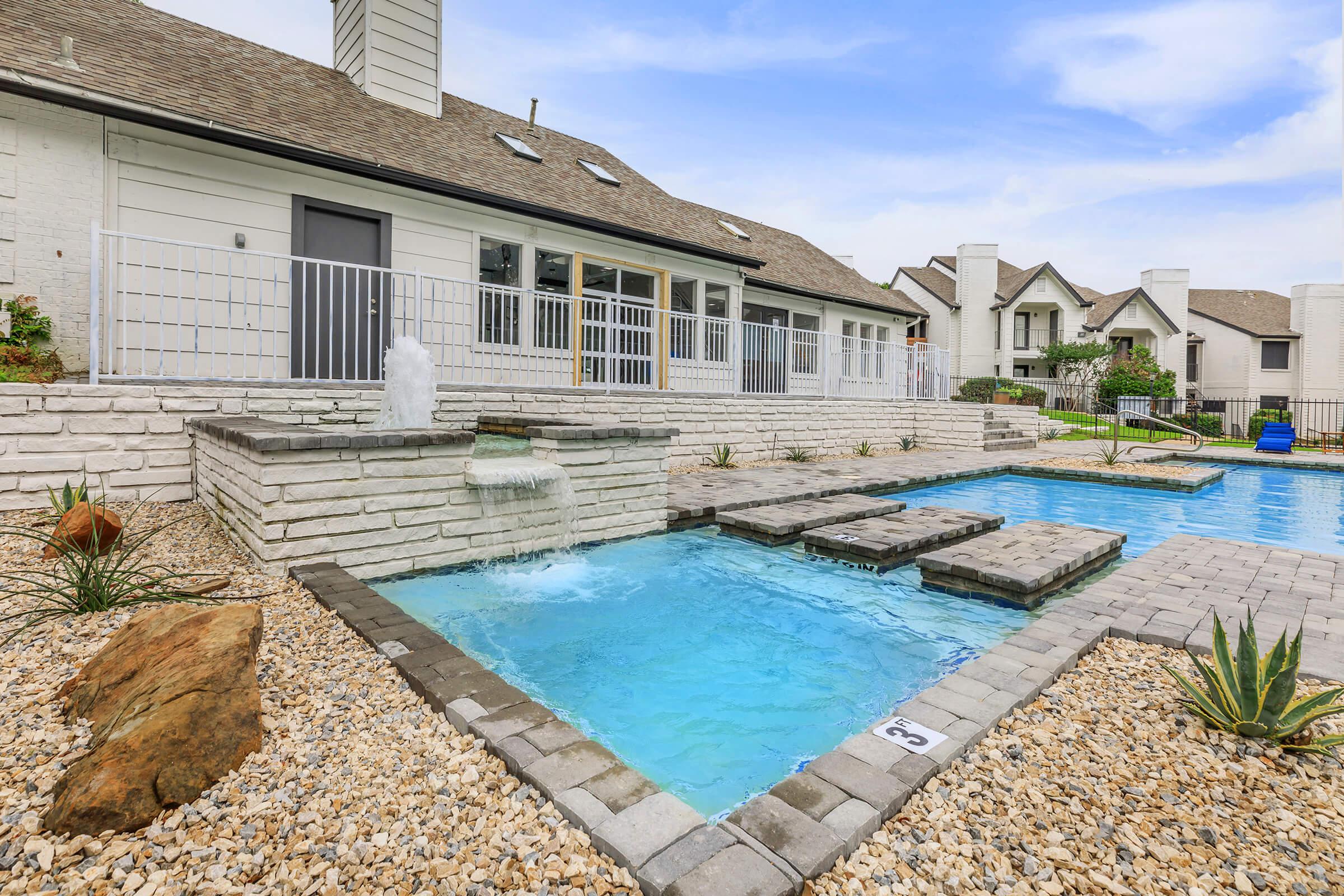 a small house in a pool of water