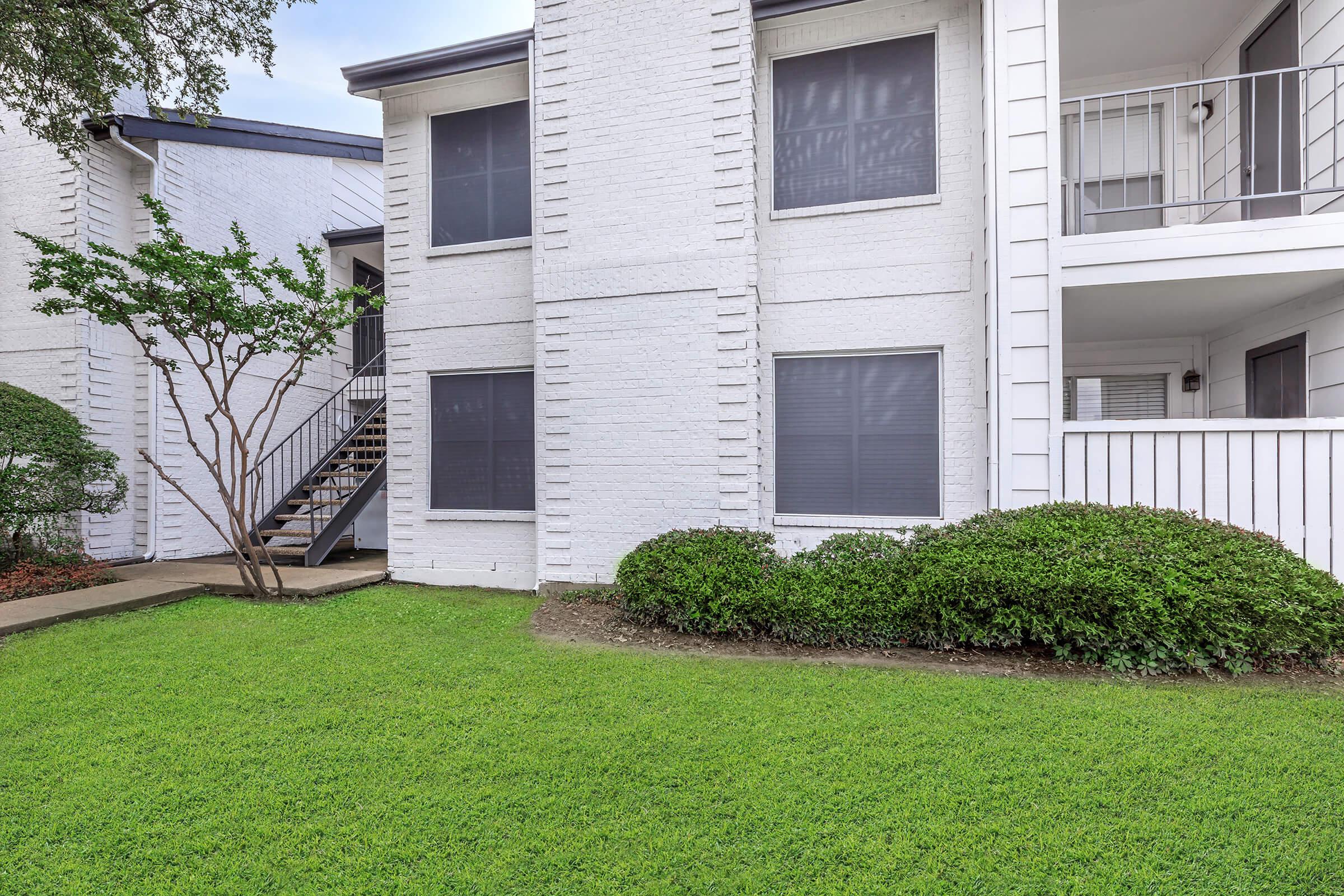 a large lawn in front of a house