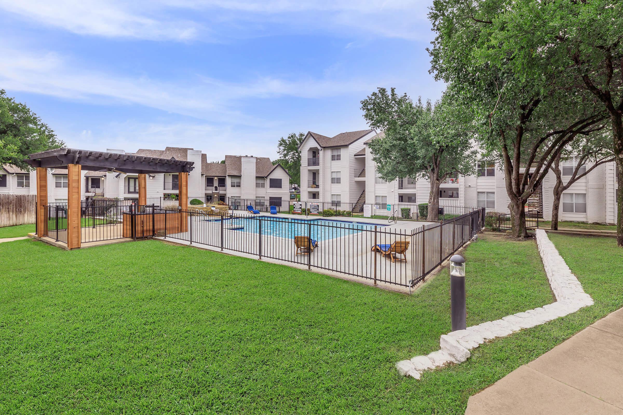 a large lawn in front of a house