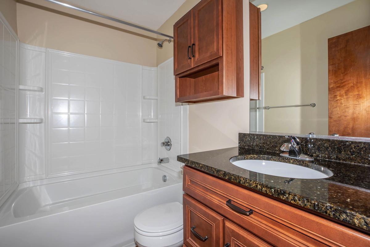 a kitchen with a stove and a sink