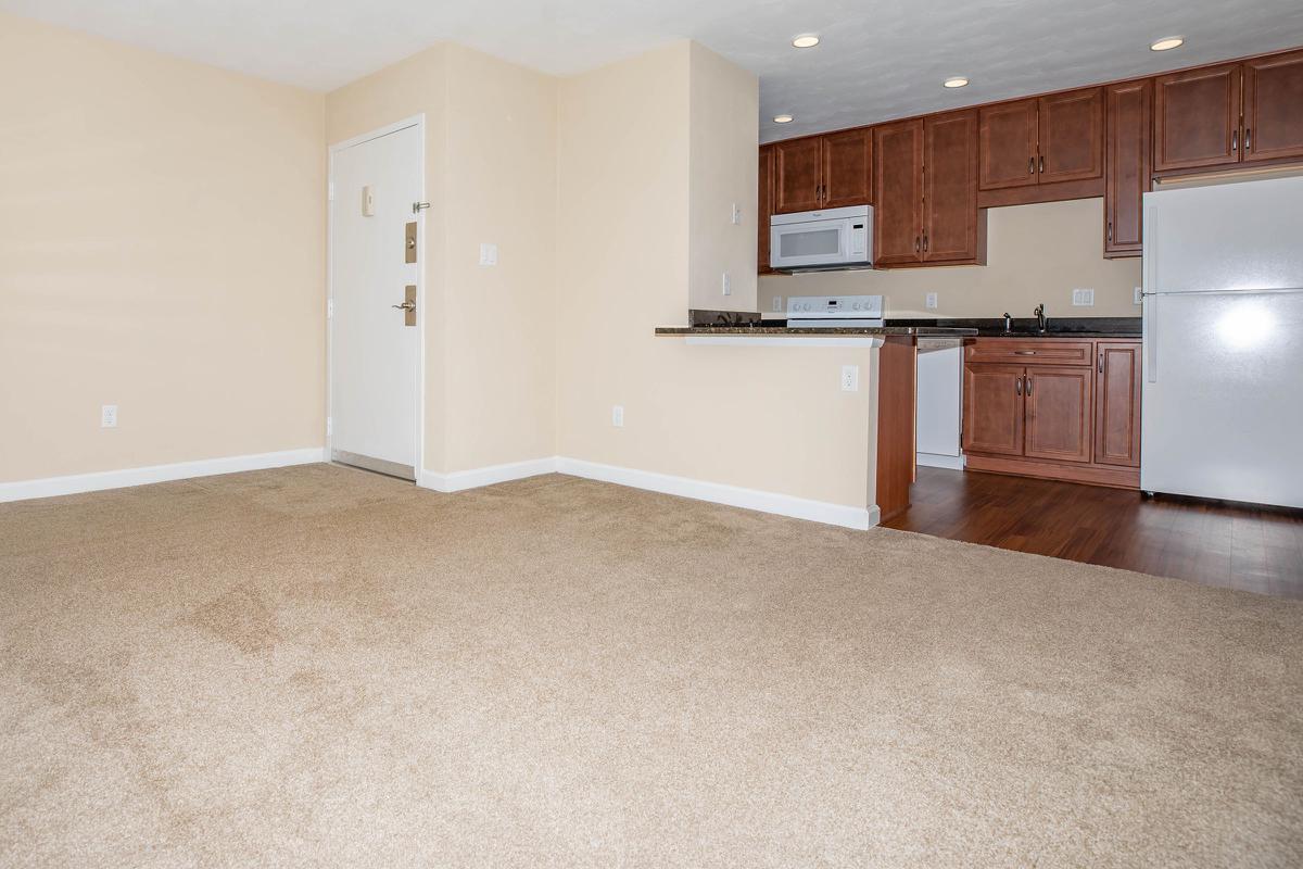 a kitchen with a wooden floor