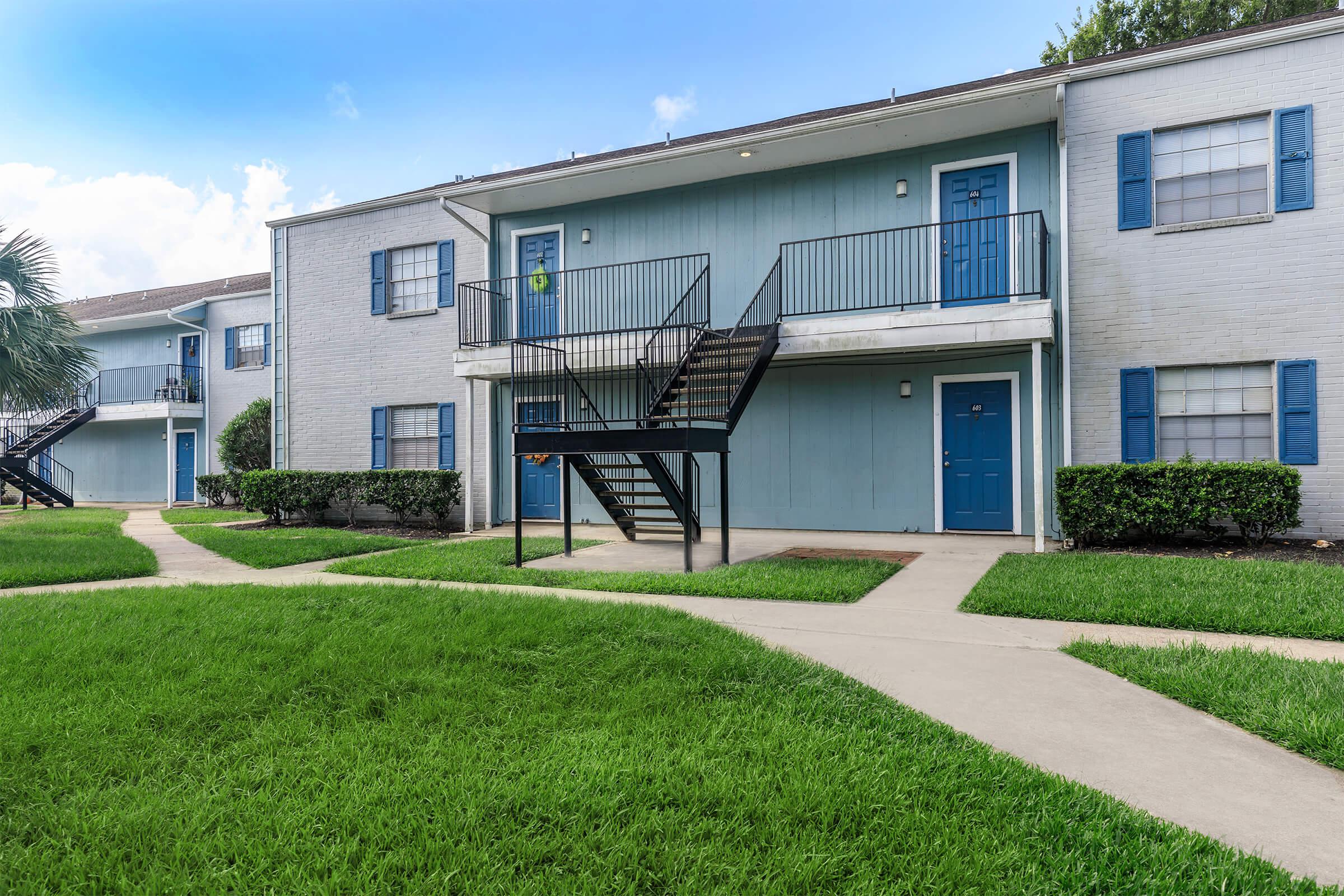 a large lawn in front of a house