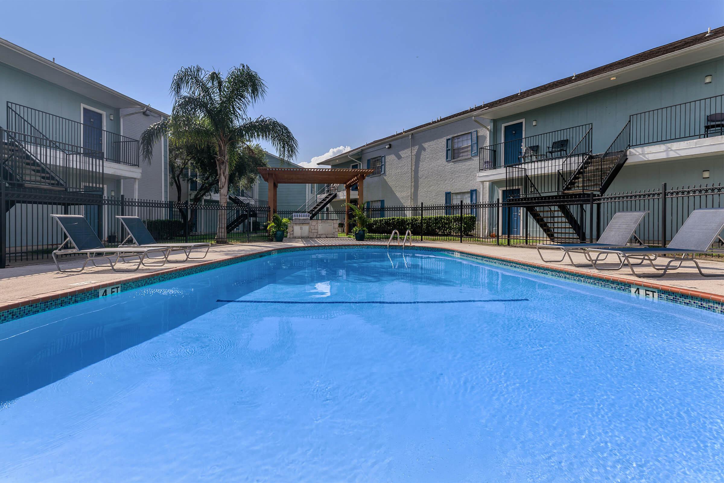 a pool next to a building