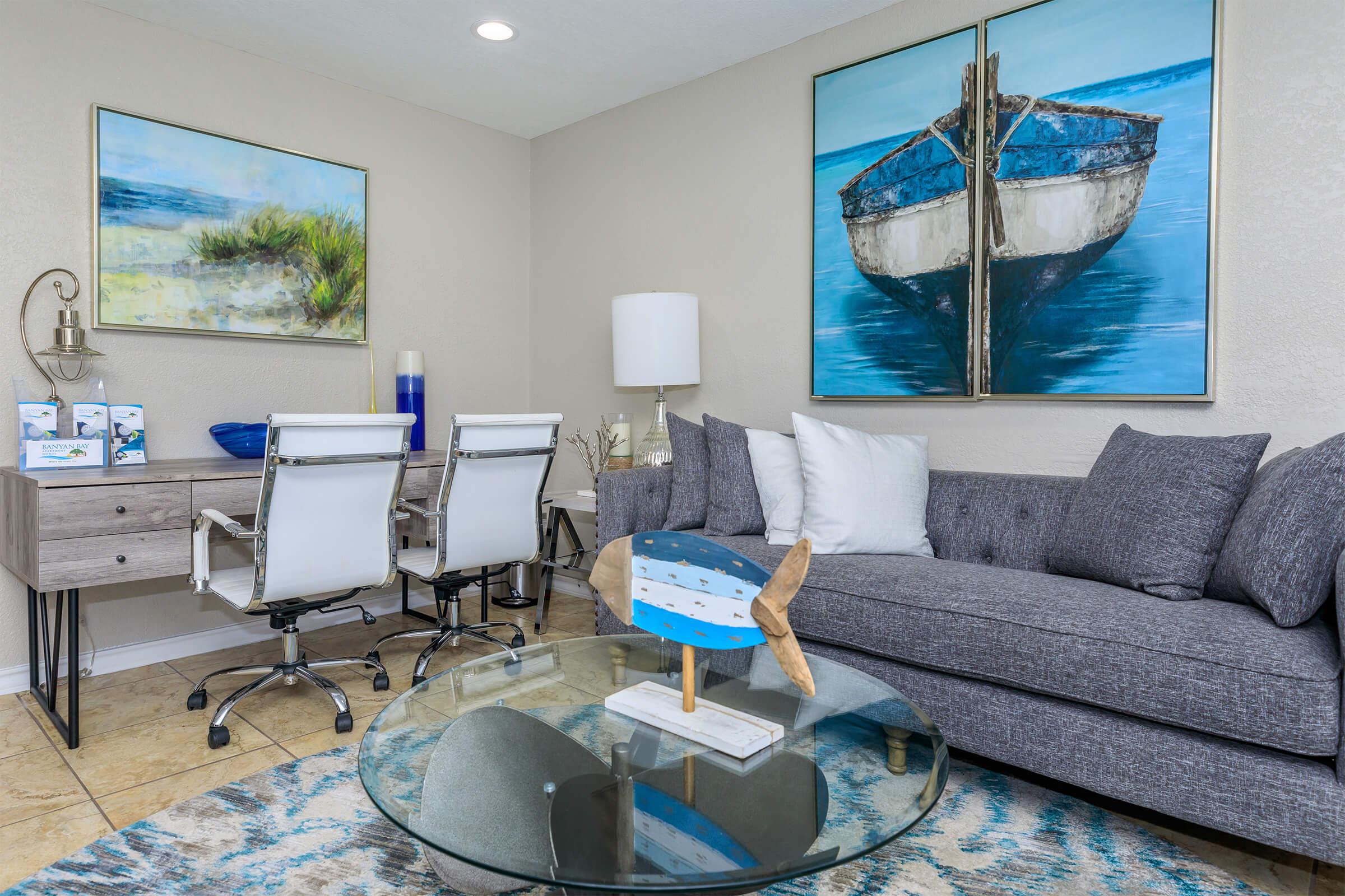 a living room with a blue chair