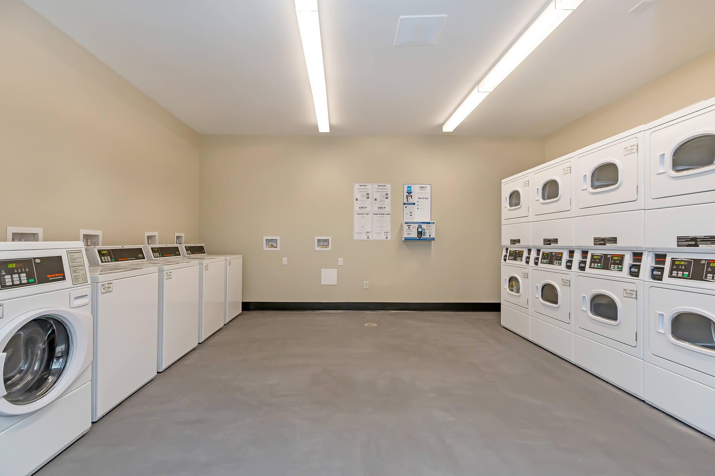 a large white refrigerator in a kitchen